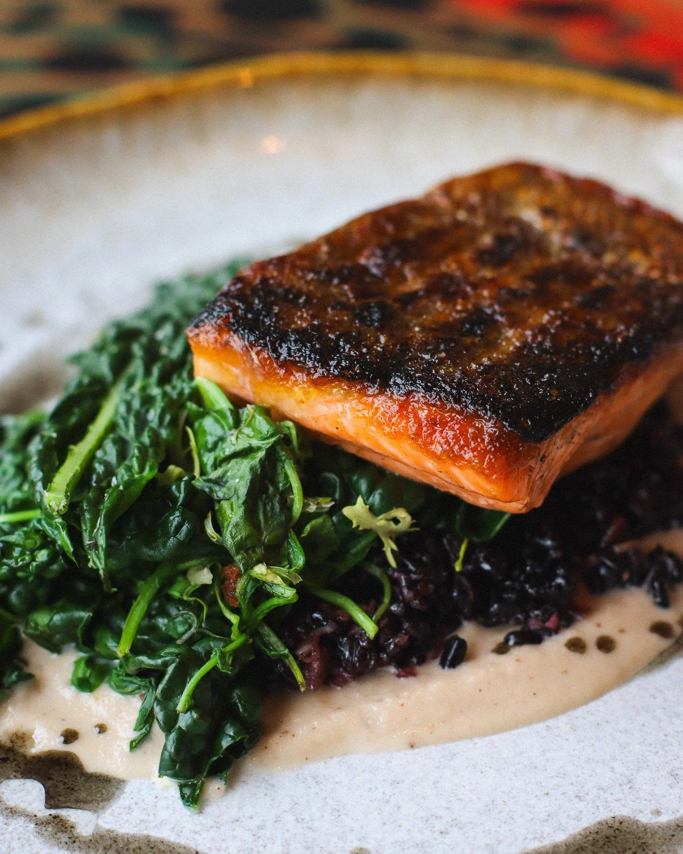 @katesfishmarket  Steelhead Trout with crispy skin, forbidden rice, marinated turnip greens, and marigold - simple, intentional, and gluten-free.

See you for dinner.

😃 Happy Hour | 4:30pm - 6pm | 𝘞𝘦𝘥 - 𝘍𝘳𝘪
🍴 Dinner served til 9pm on Wed &am