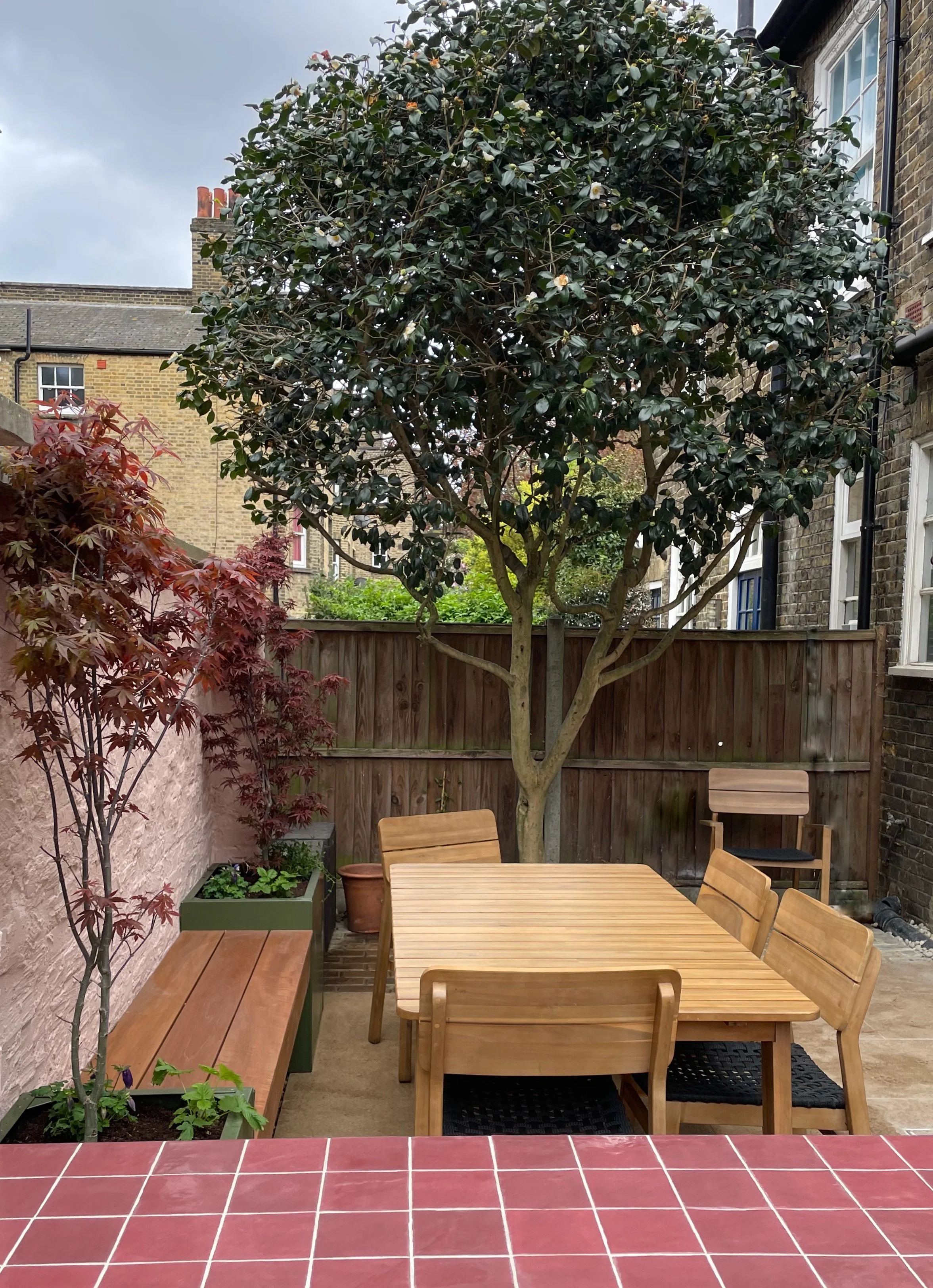 Courtyard garden south London with outdoor cooking area