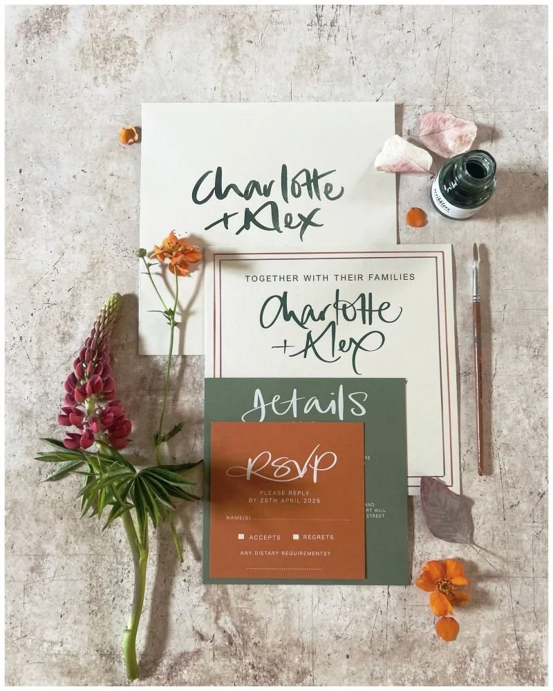 a flatlay of wedding stationery invites 