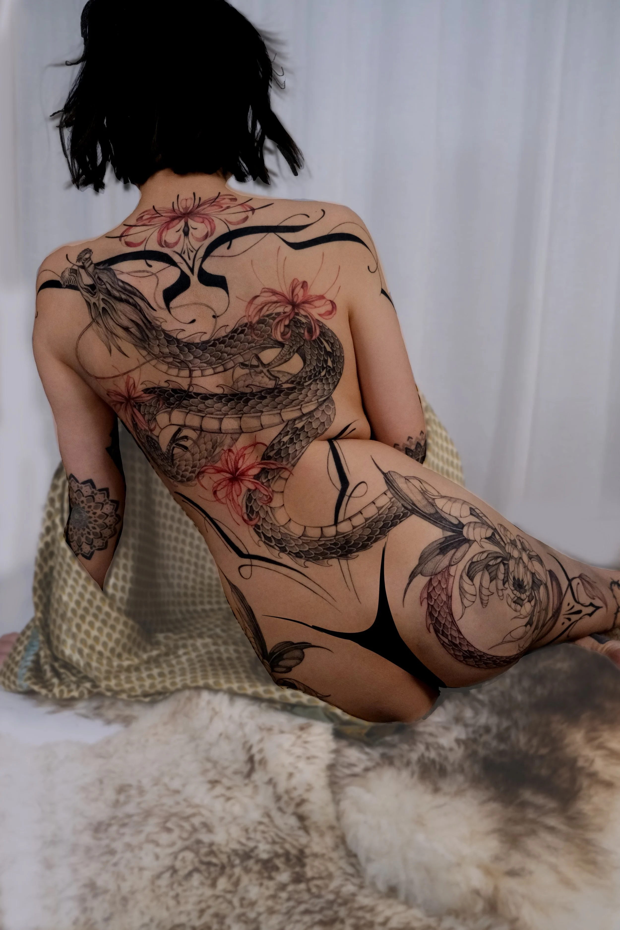 draak rug body suit