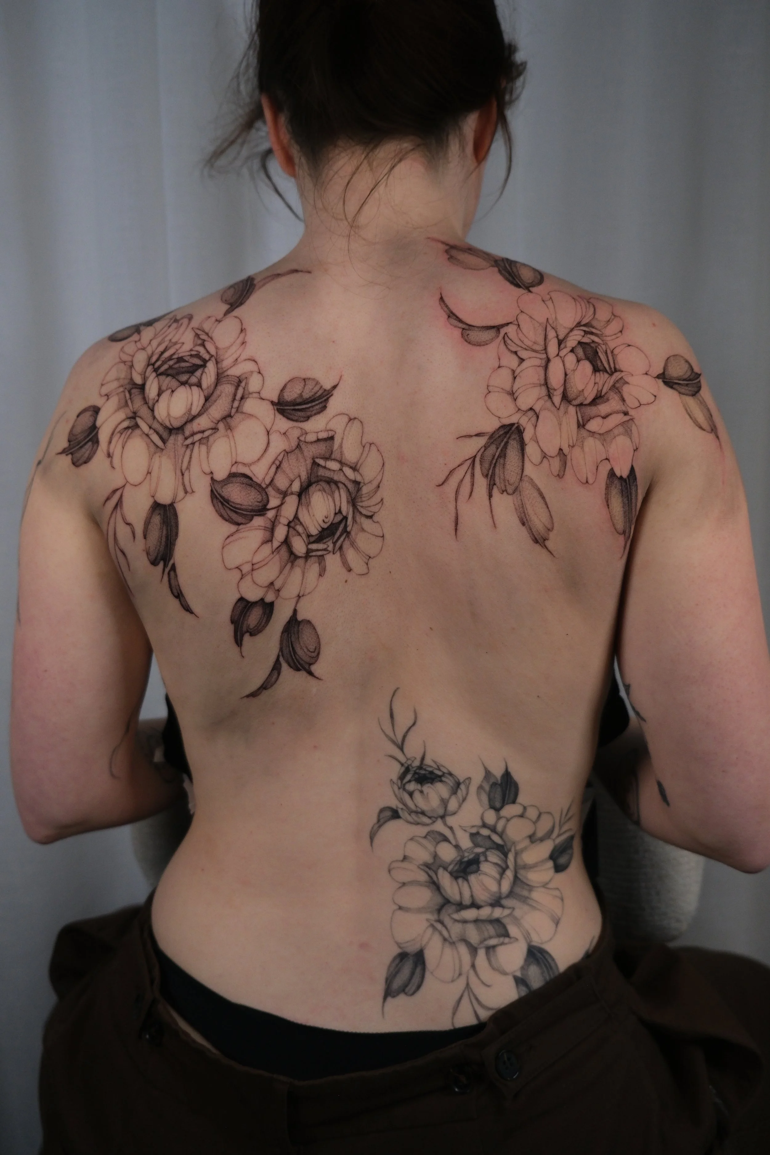 bloemen rug tattoo