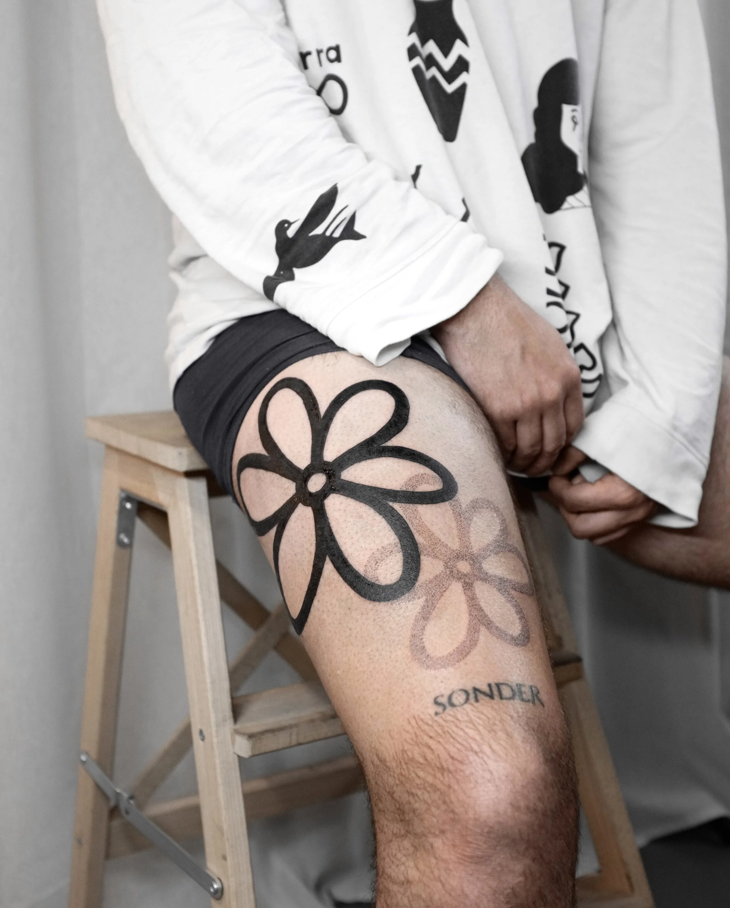 flower tattoo leg