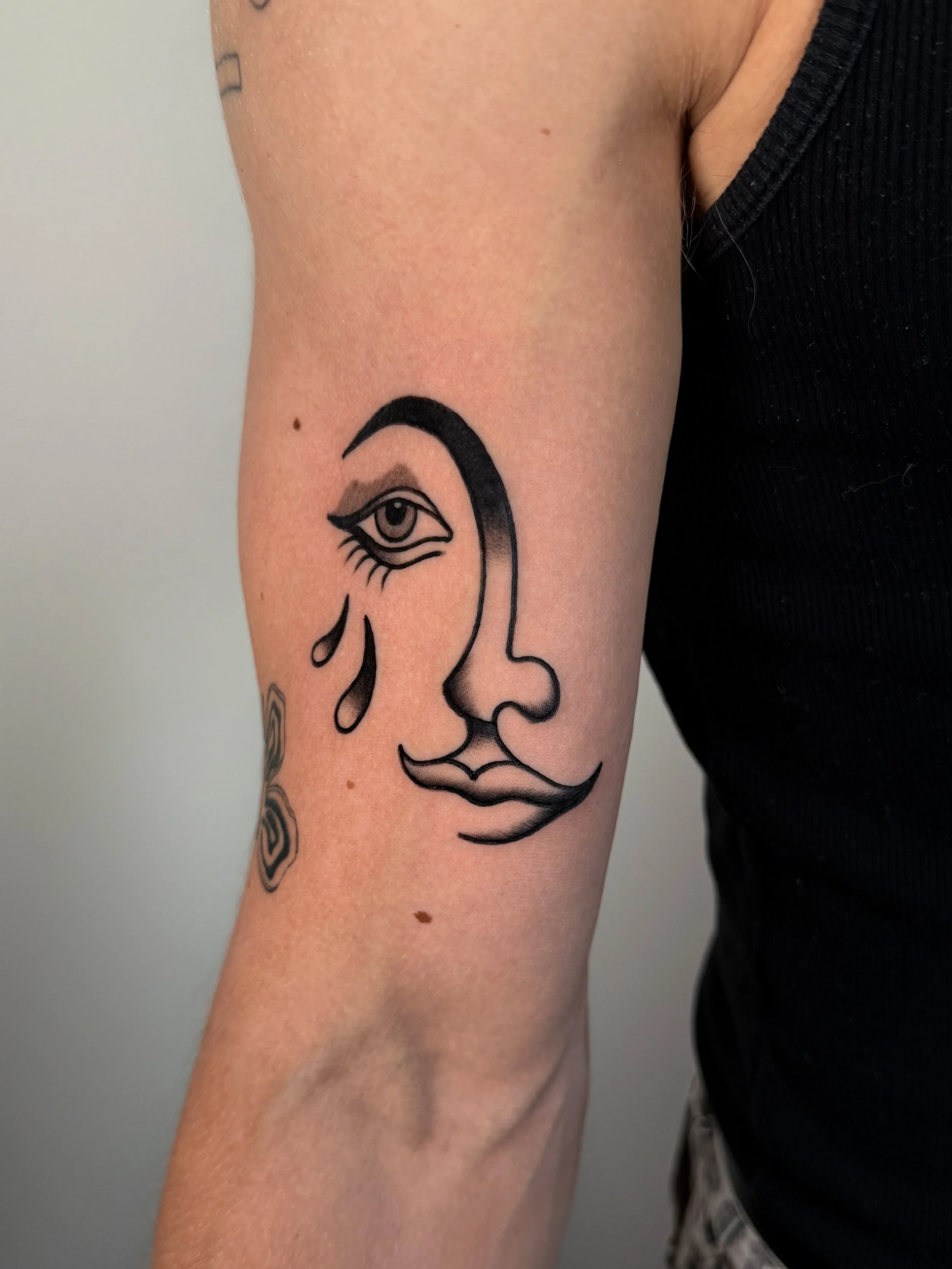 woman face tattoo
