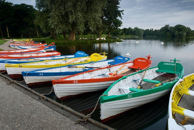 Brightly coloured boat moored up on the mere at Thorpeness