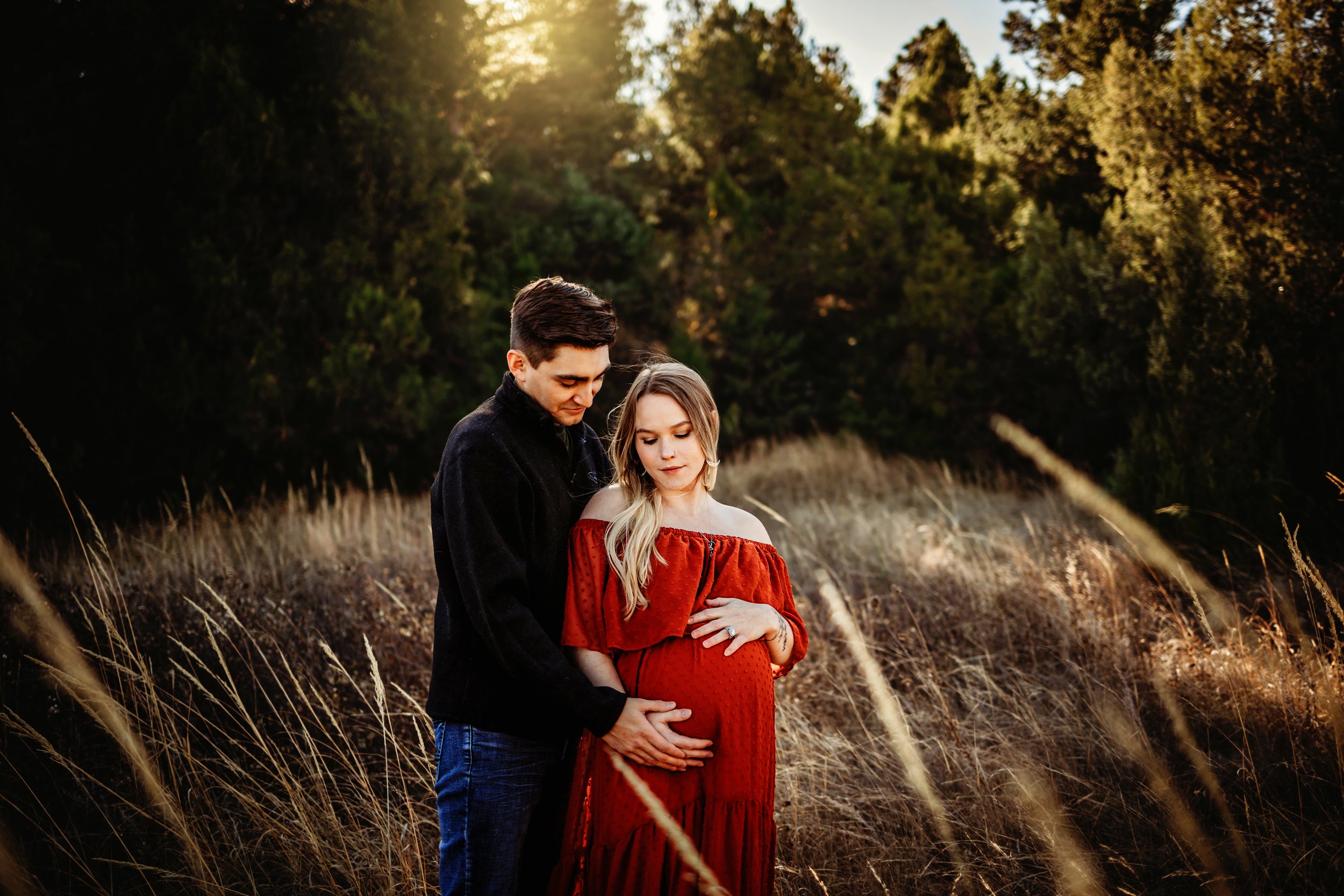 maternity couple glowing