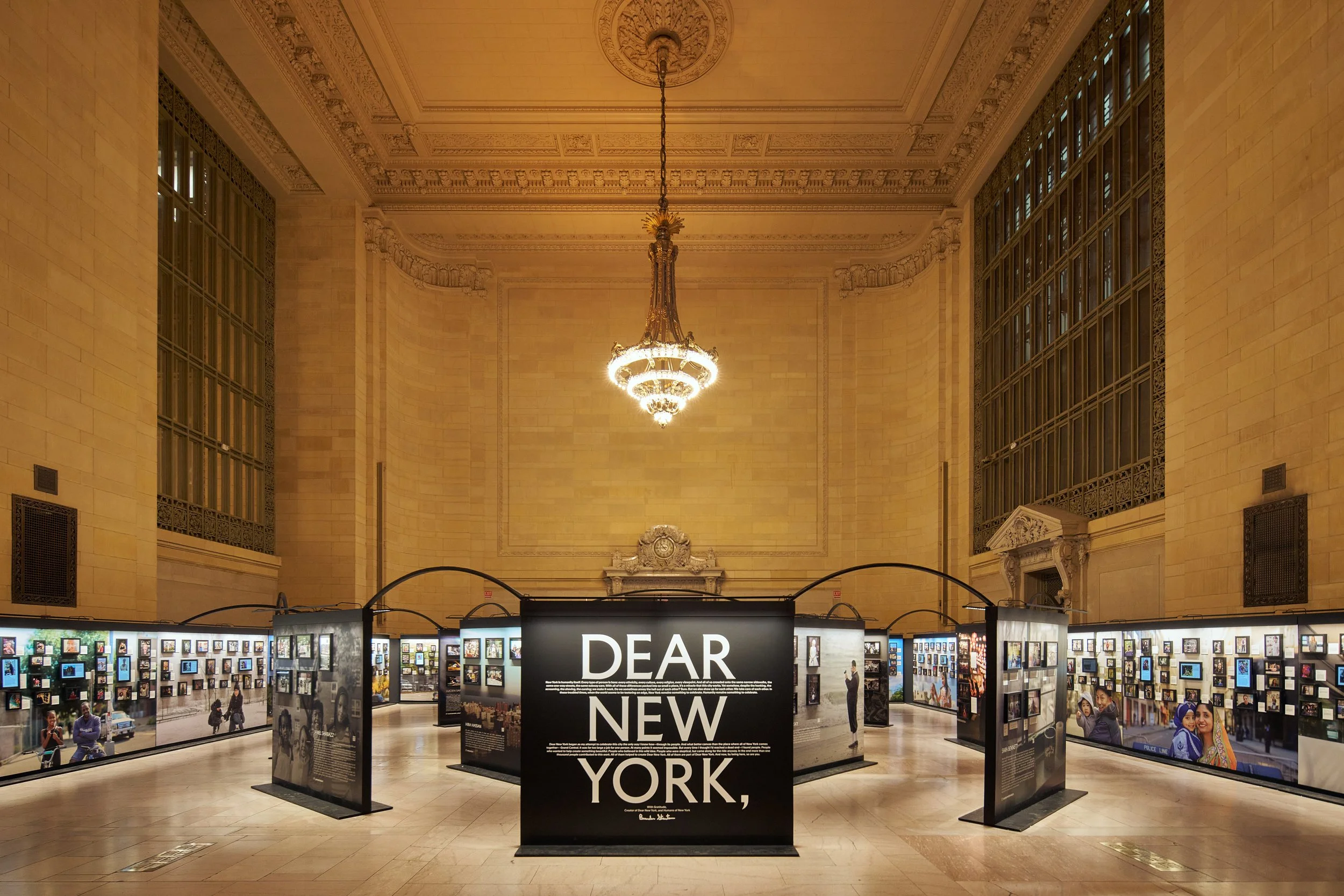 In Grand Central’s iconic Vanderbilt Hall, a blended photography-exhibition designed by David Korin displayed the work of six-hundred student artists alongside the work of eleven established NYC artists, including street photography legend Jamel Shab