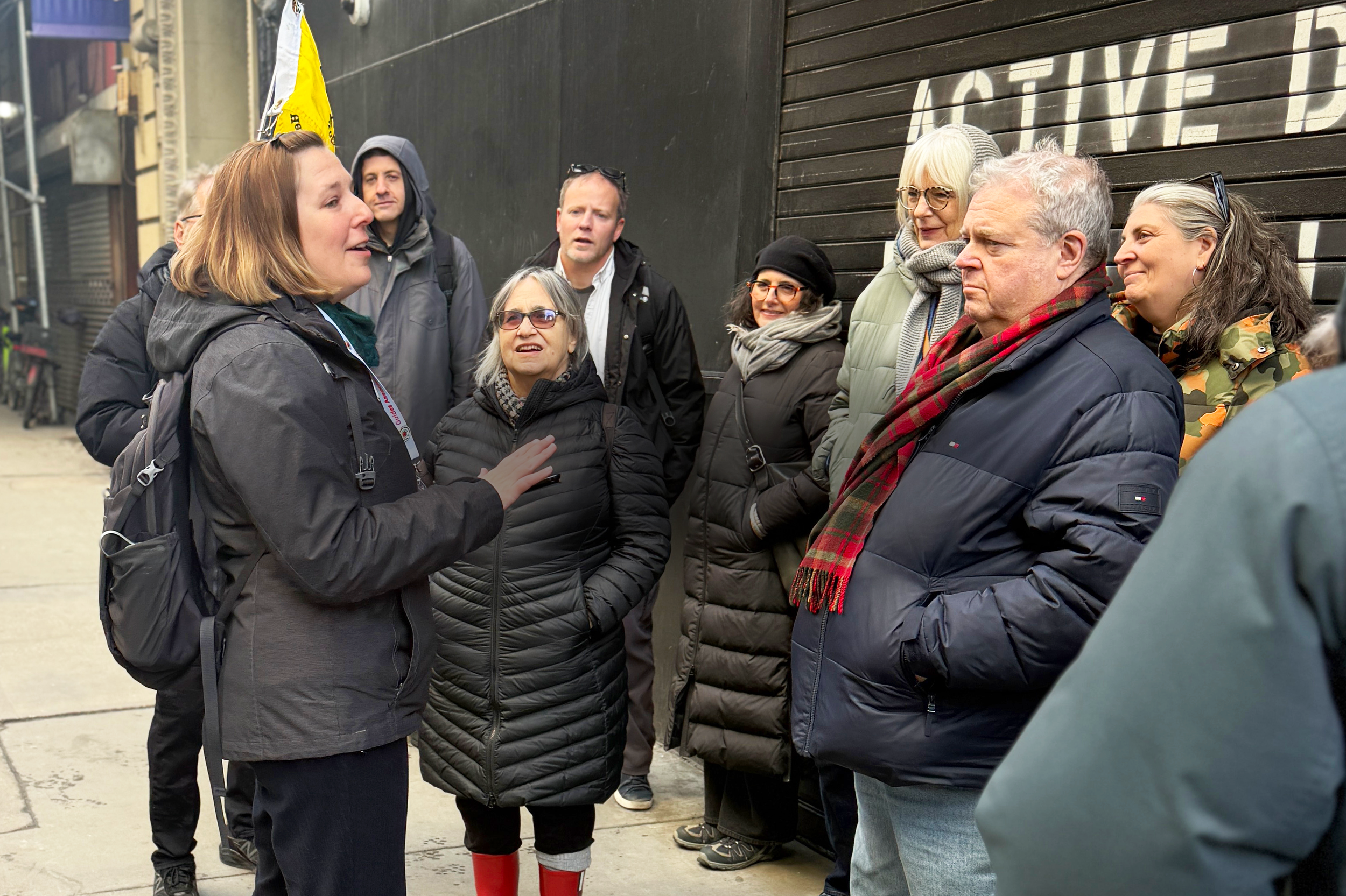 Tour guide with small group of interested guests.