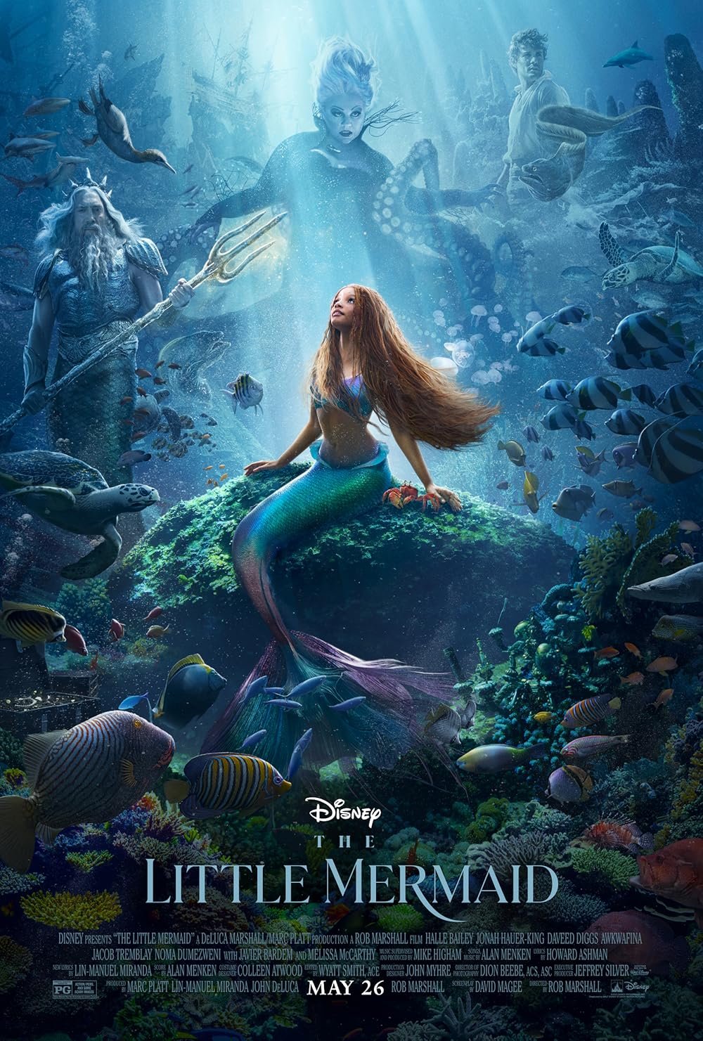 Poster for Disney's 'The Little Mermaid' featuring a mermaid sitting on a rock underwater, surrounded by sea creatures and other characters from the movie.