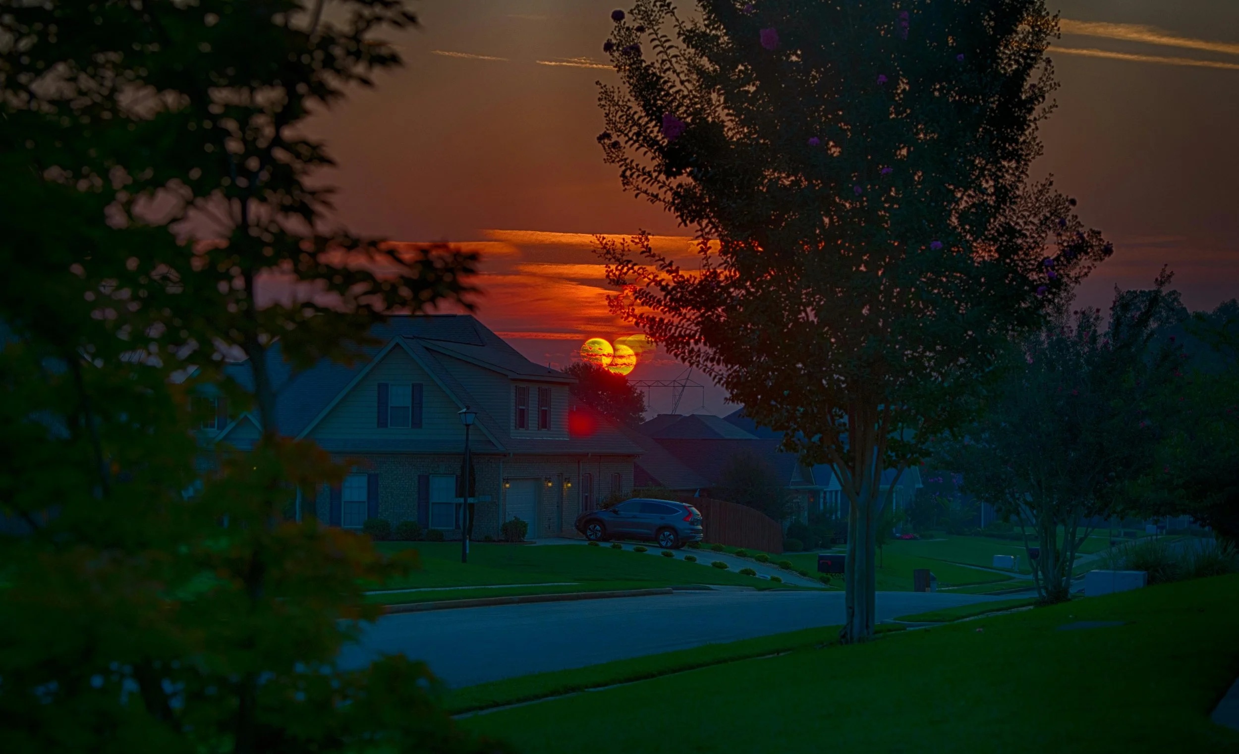 colorful sunset over alabama home