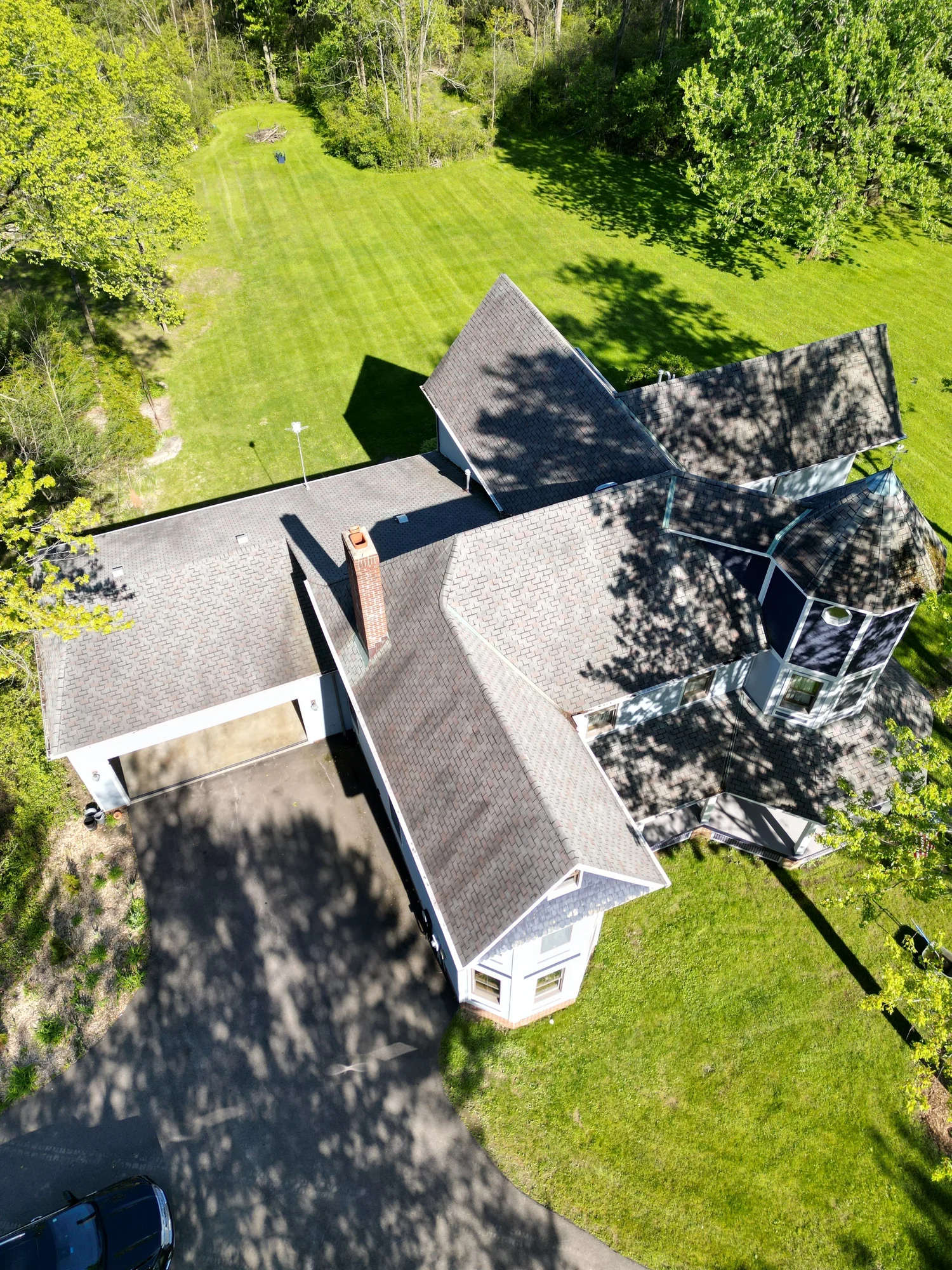 Completed luxury roof replacement — aerial view