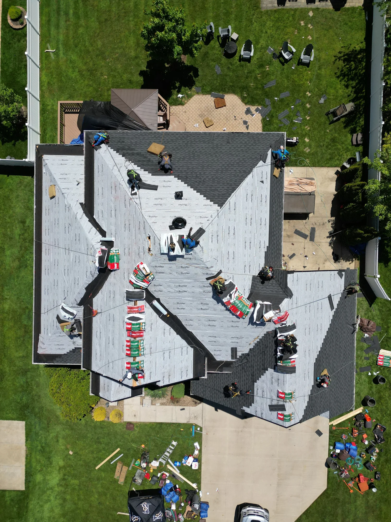 Roof installation in progress — aerial view