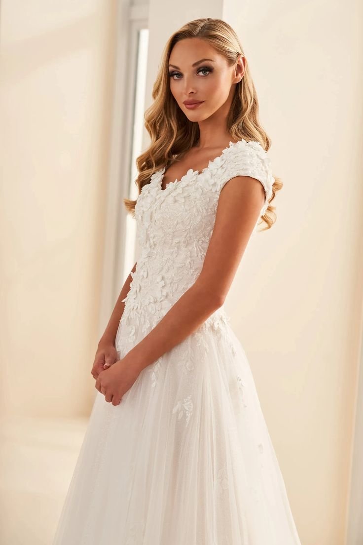 MOD1803 _ Mon Cheri Bridals.jpeg
