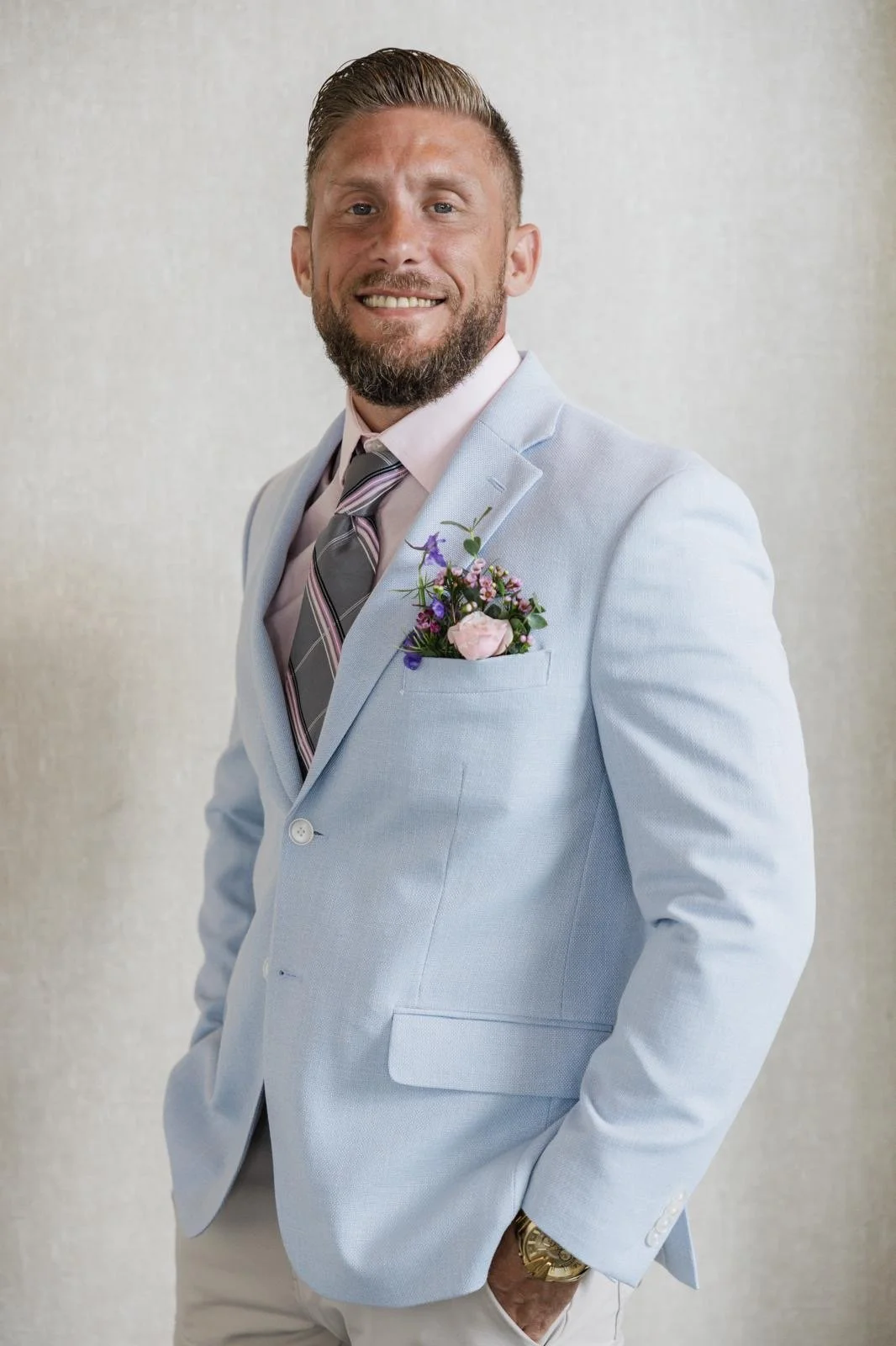 Logo of Opulent Construction Group with a circular emblem and the company name in white on a black background.