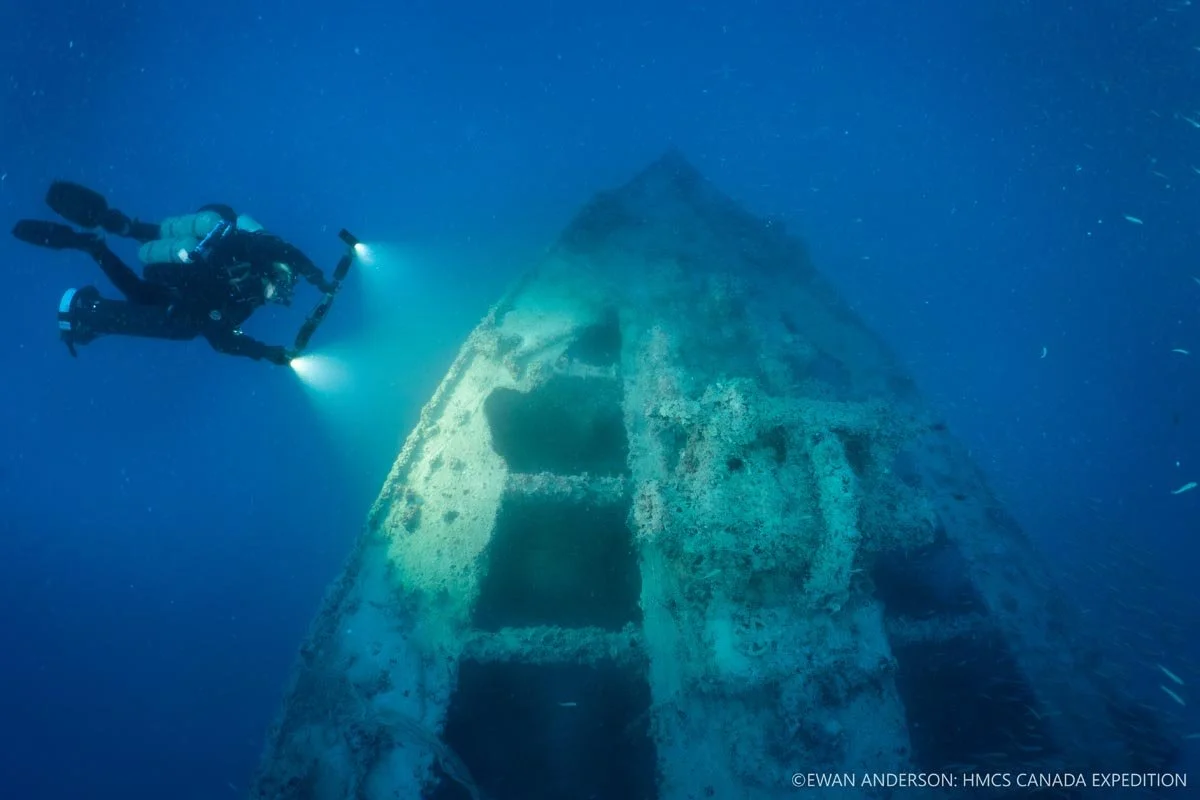 Detail view of the anchor windlass on the foredeck of HMCS Canada under artificial
illumination.