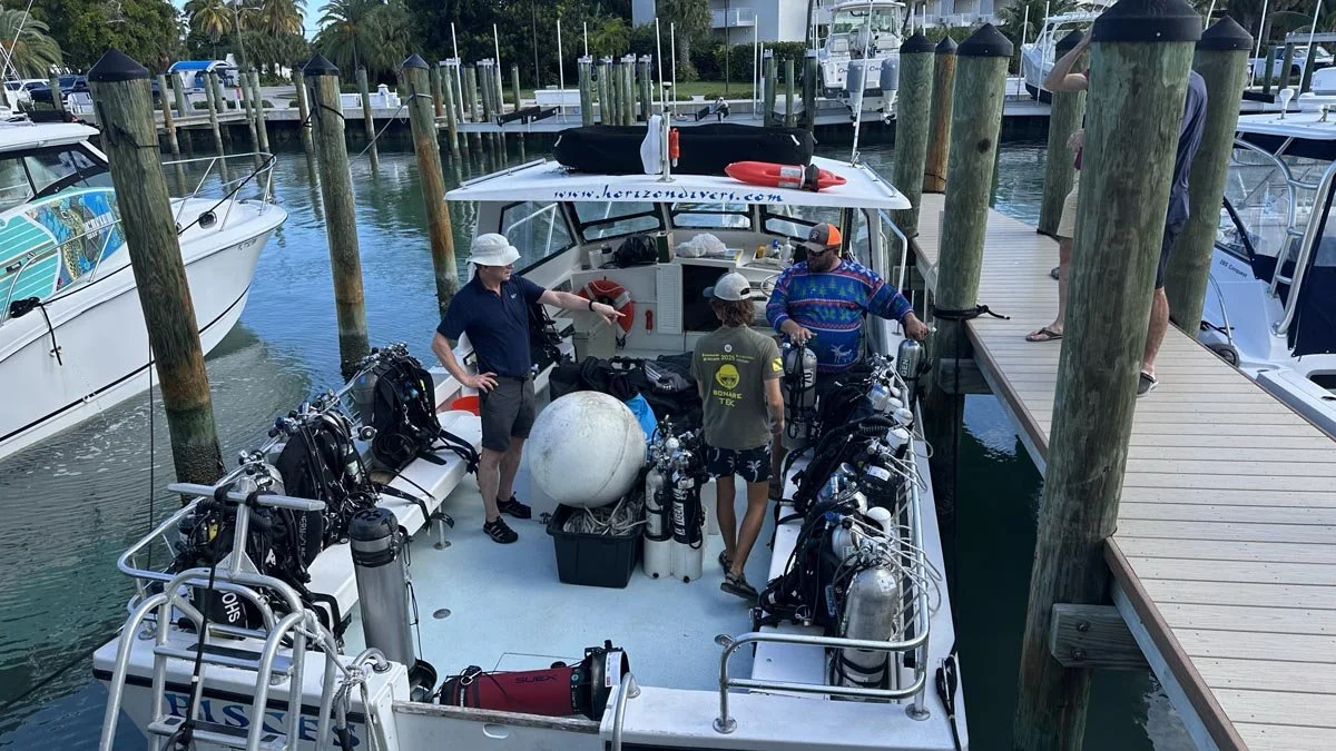 Loading the expedition dive vessel Pisces on the first morning of operations. From left to right: Roger Lacasse, 3D Photogrammetry Lead; Luke Dunn, First Mate; and Jeff Knapp, Captain. Pisces and her crew are operated by Horizon Divers, Key Largo.