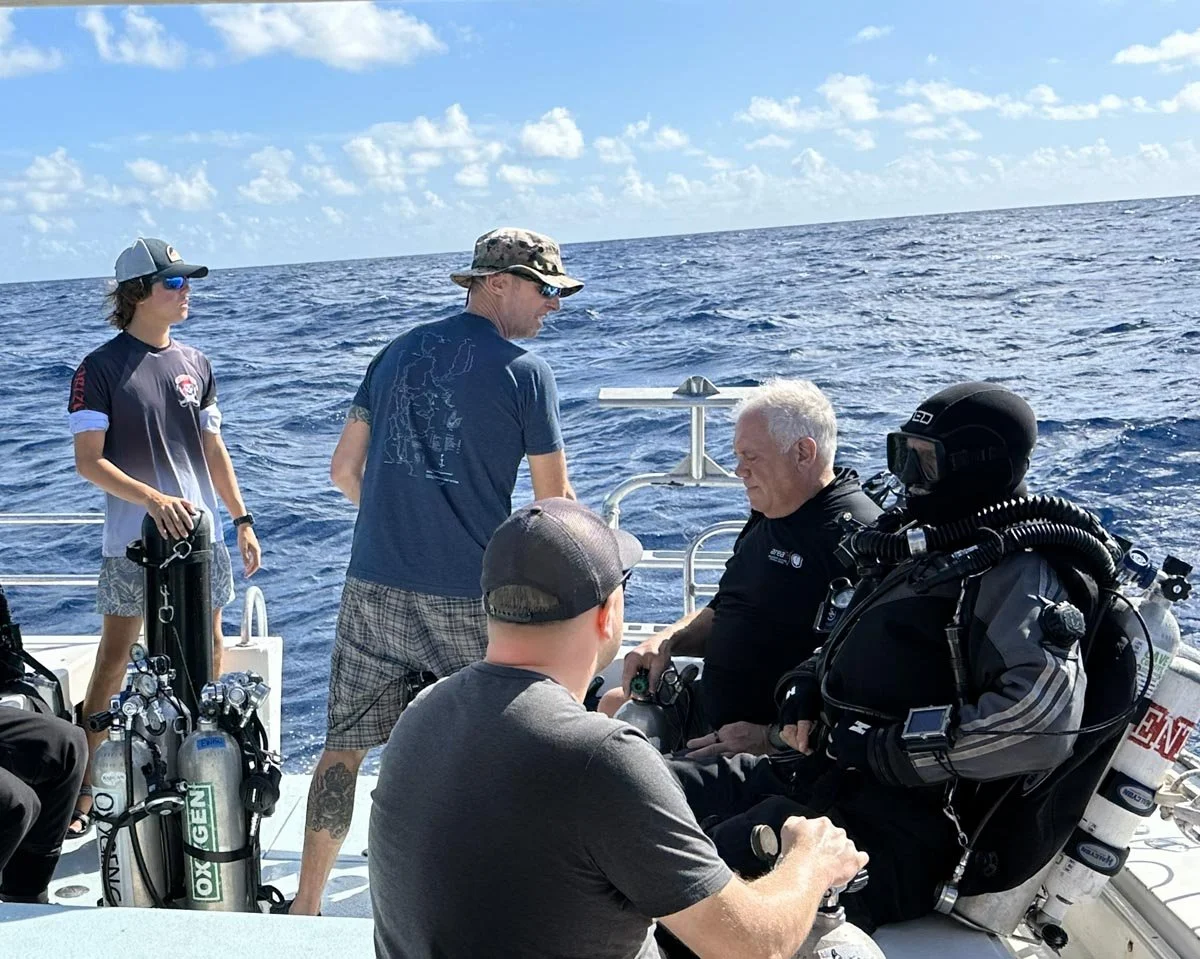 Guy Shockey and Kelvin Davidson prepare to dive. From left to right: Luke Dunn, Rob DeProy, Jason Cook, Guy Shockey, Kelvin Davidson.