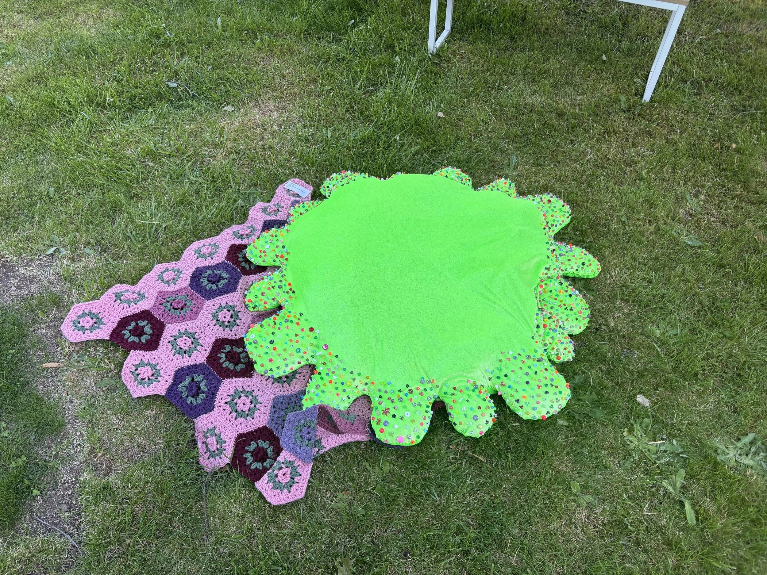 "Special flower," fabric and hand beading, reclaimed filler, May 2025.