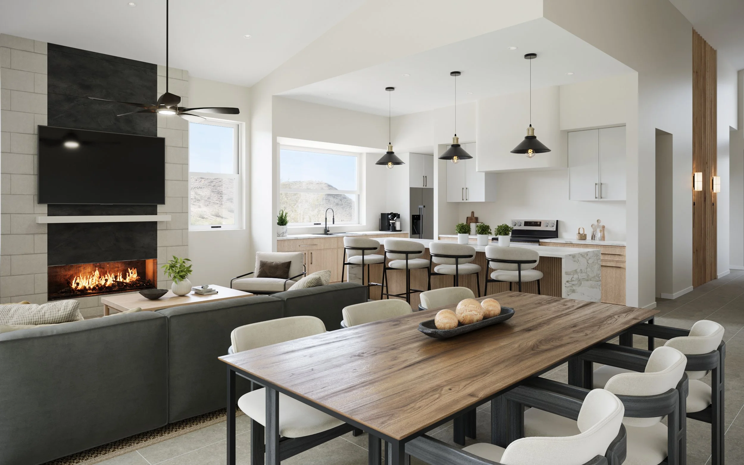 Open-concept living and dining area with modern decor, fireplace, flat-screen tv, kitchen island with barstools, large windows, and ceiling pendant lights.