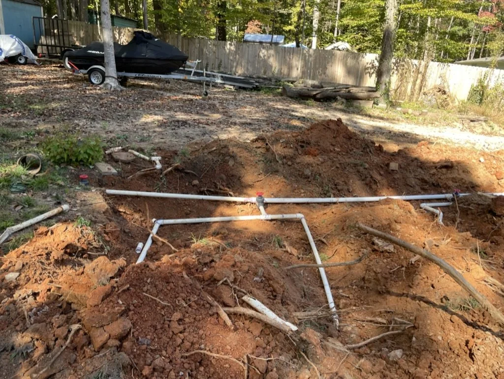 New Tanks Connected to Existing Drain field with new Main intalled