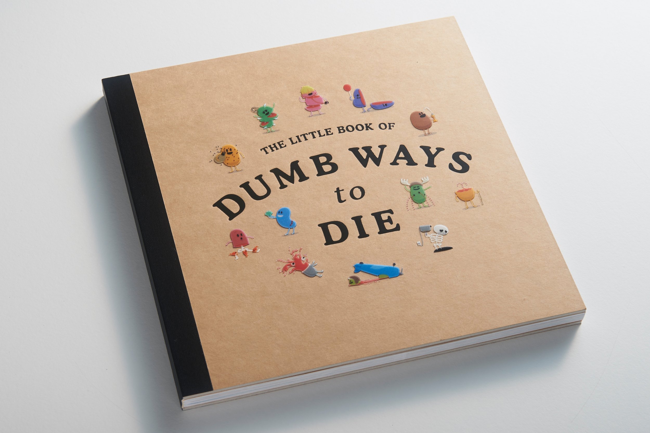 The Little Book of Dumb Ways to Die with cartoon characters on cover