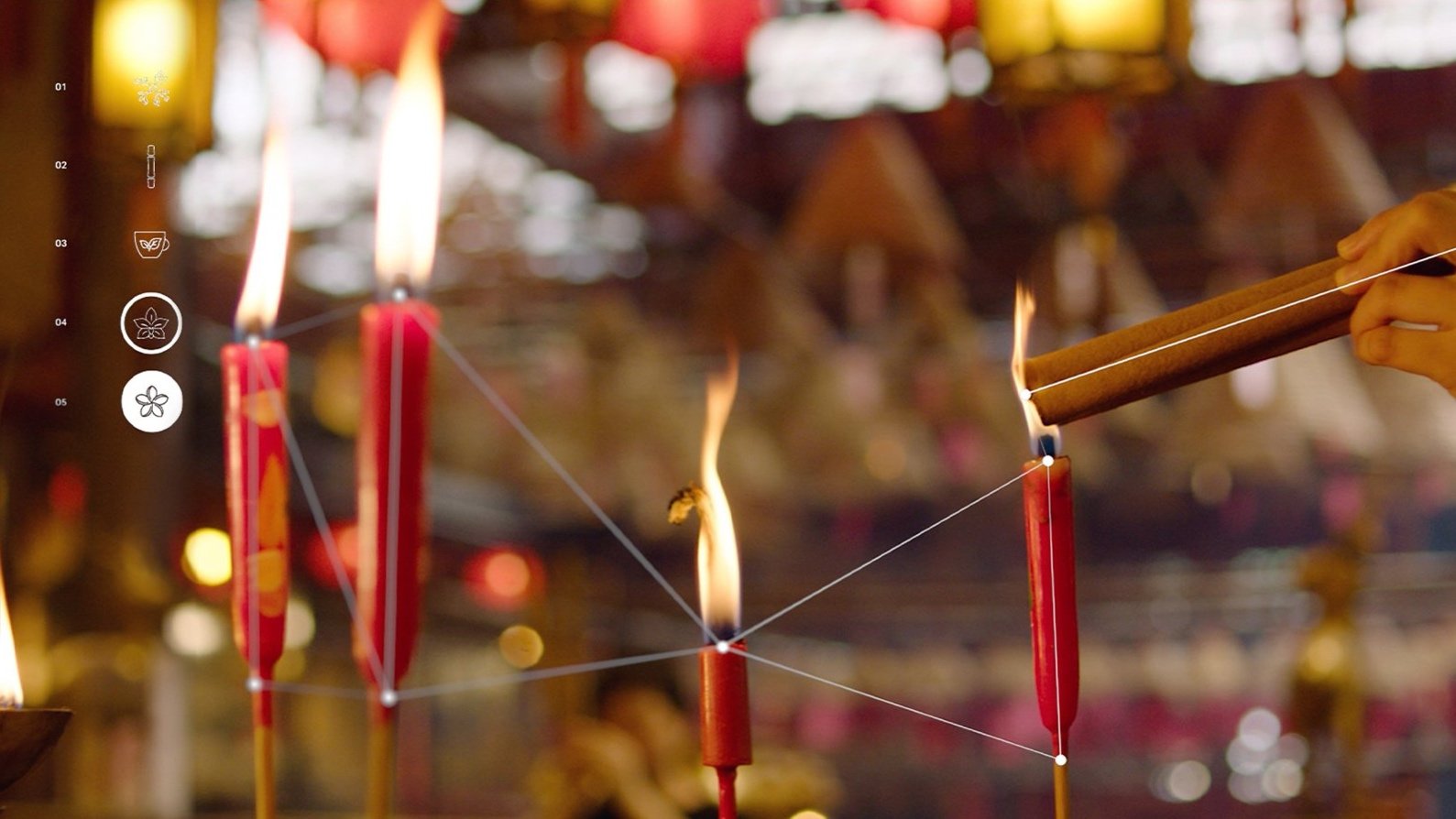 Lit red candles in a temple setting with incense stick on the right, featuring icons and symbols overlayed on the left side.