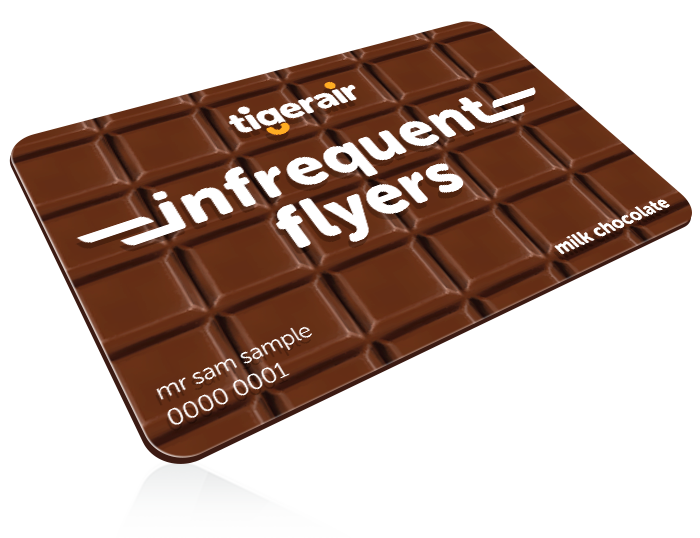 Chocolate bar with Tigerair infrequent flyers branding and text "milk chocolate."