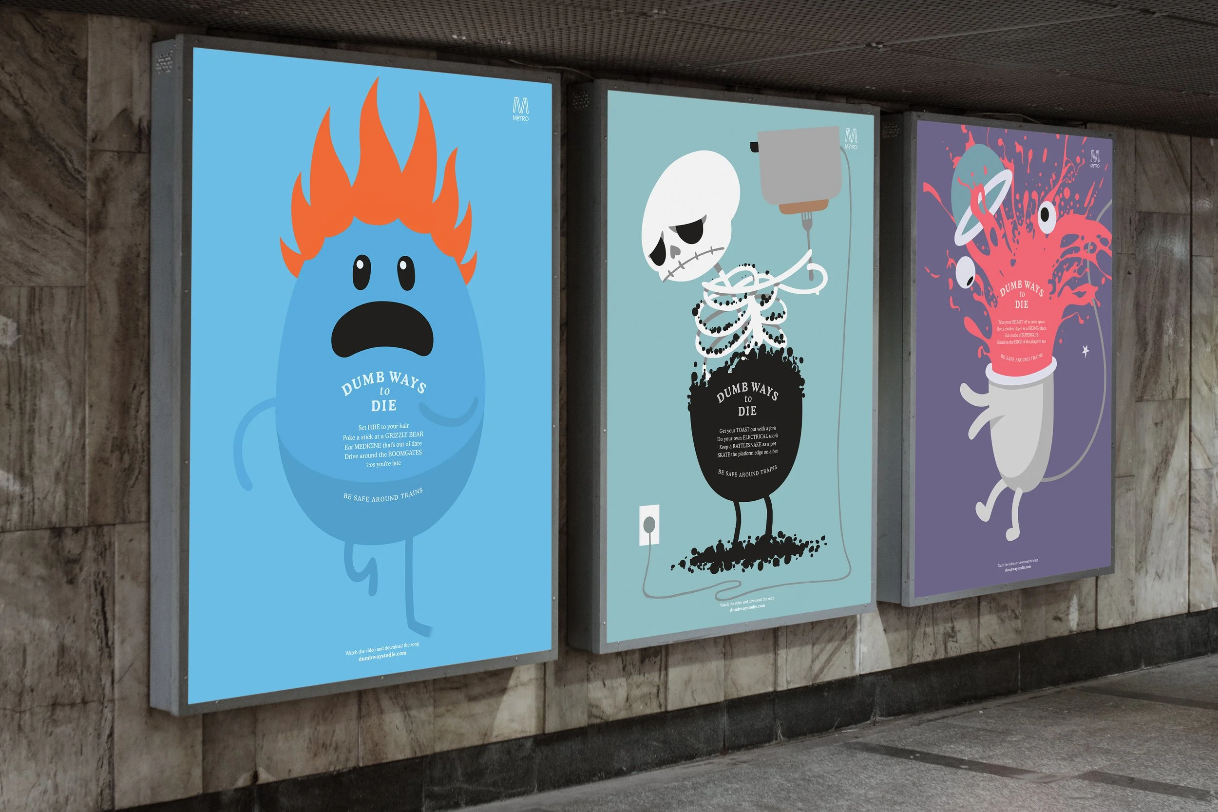 Subway wall with three colorful "Dumb Ways to Die" posters featuring cartoon characters in humorous dangerous situations. Characters include a blue figure with fire on its head, a skeleton with an electrical plug, and a character with a bleeding head
