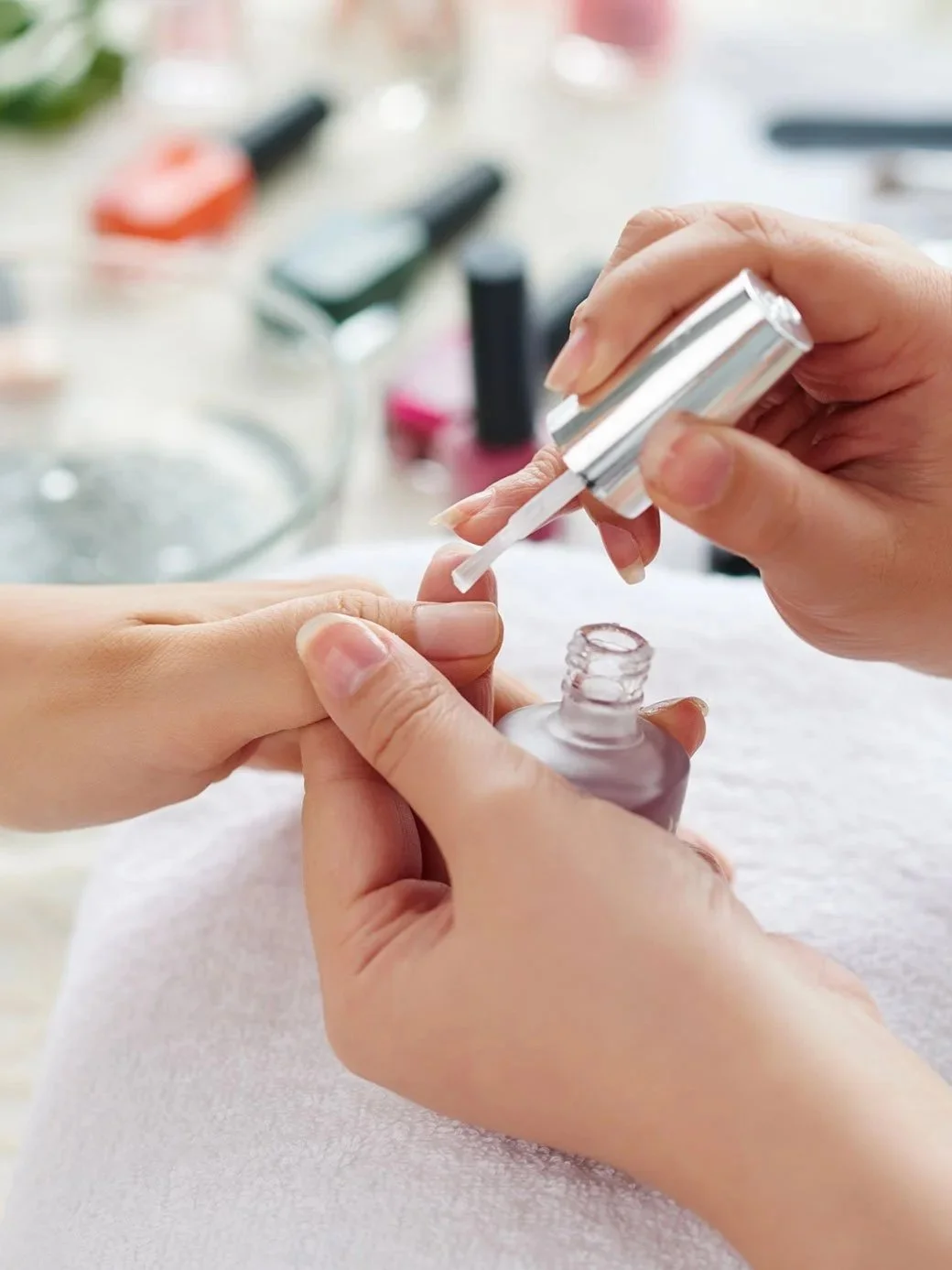 Manicure treatment at The Ivy Day Spa in Santa Clarita with nail polish being applied for a polished, professional finish.