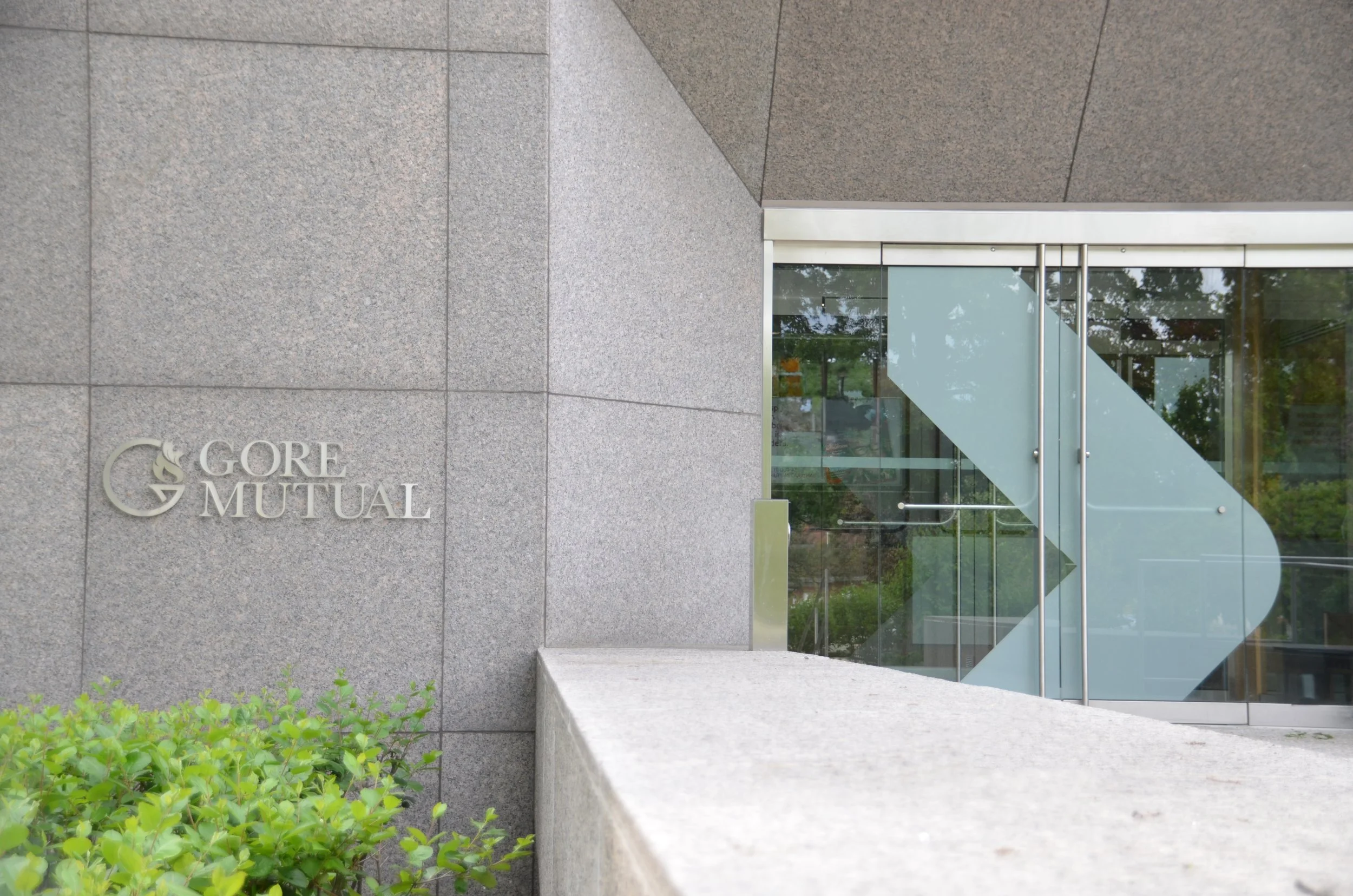 Gore Mutual Exterior Aluminum Router cut wall mounted sign