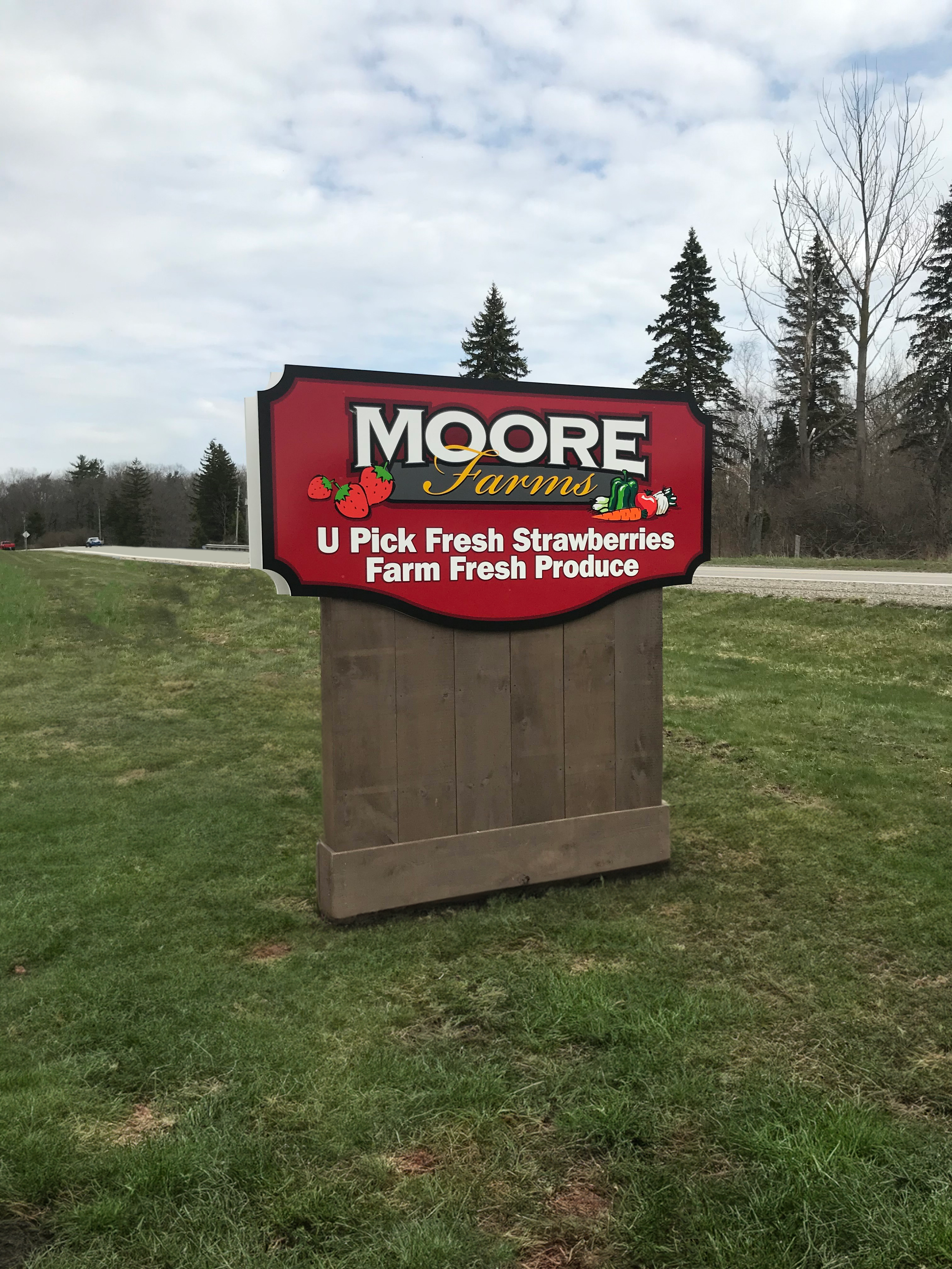 Moore Farms roadside standing sign