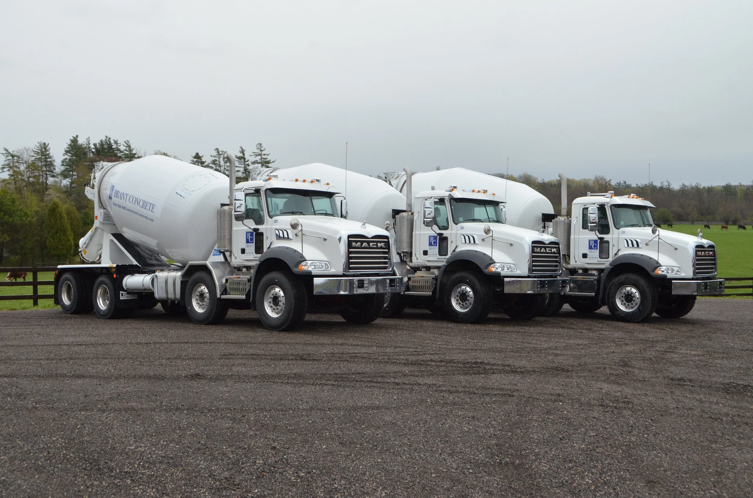 3 matching Brantford Concrete cement trucks with cut vinyl fleet graphics  