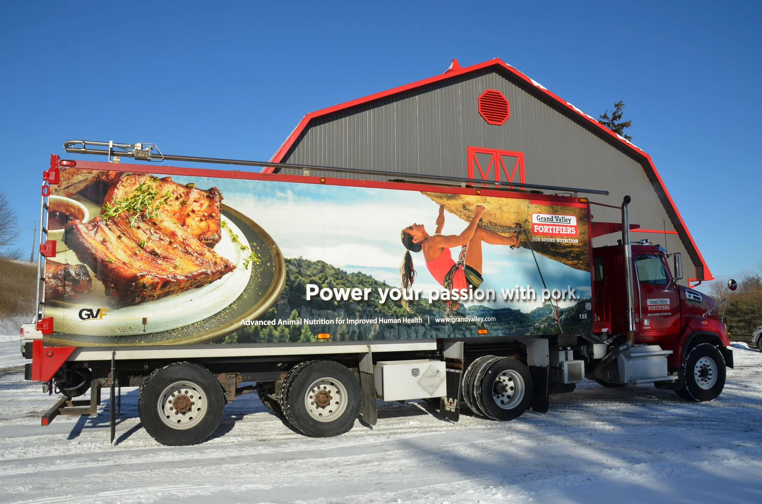 Grand Valley Fortifiers Power your passion with pork feed truck 3M wrap 