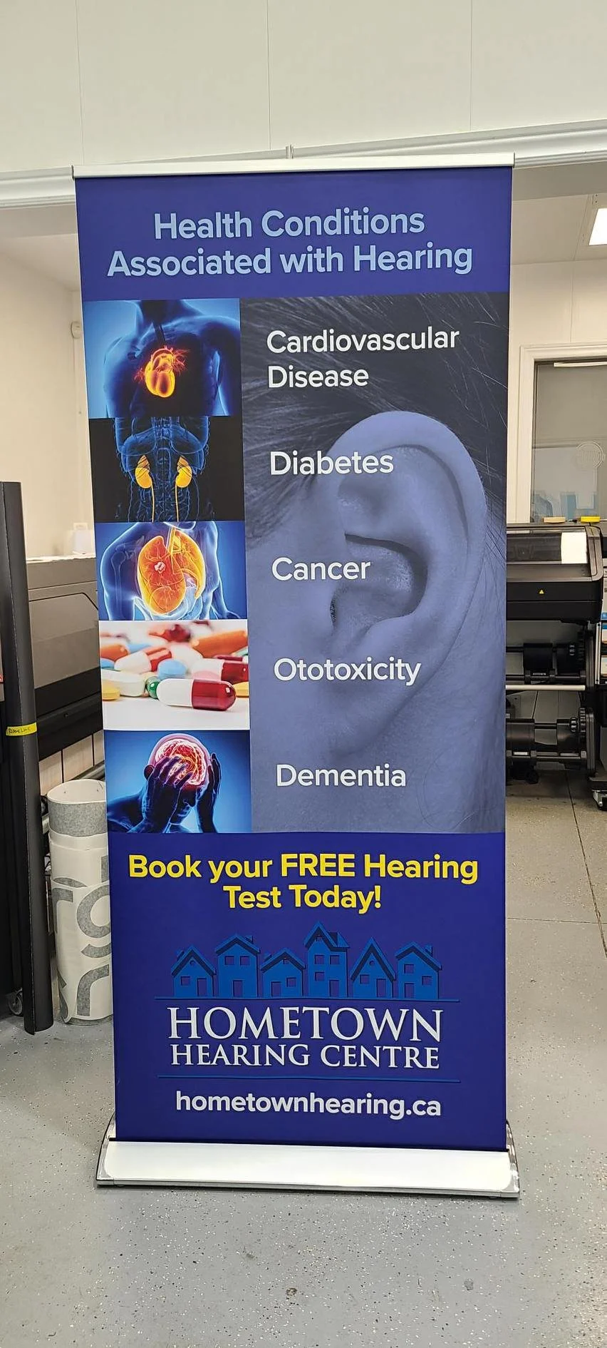 A promotional banner from Hometown Hearing Centre highlighting health conditions associated with hearing loss, including cardiovascular disease, diabetes, cancer, ototoxicity, and dementia, with a call to action to book a free hearing test.