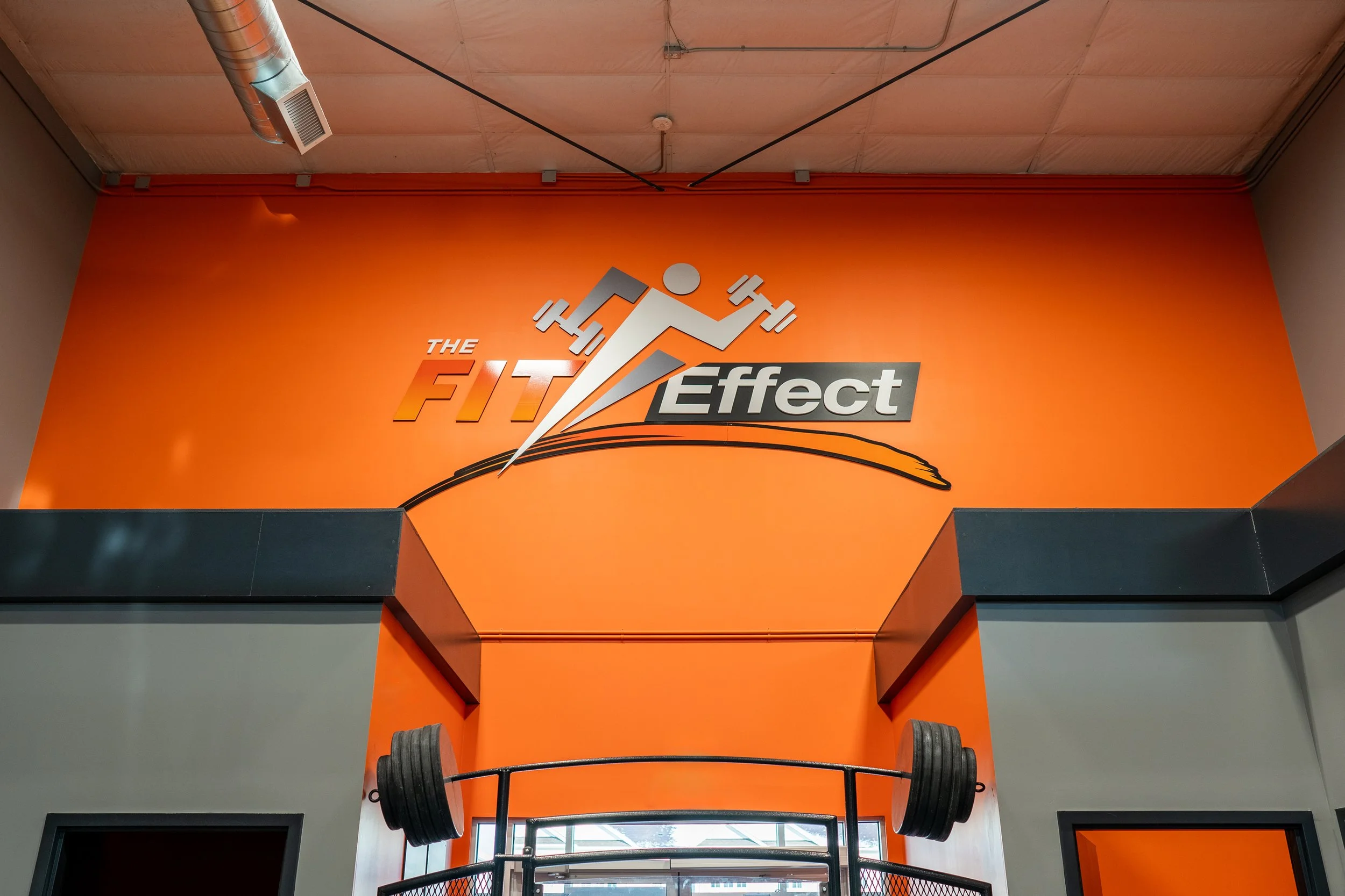 Fit Effect Interior dimensional acrylic and print cut vinyl wall lettering 