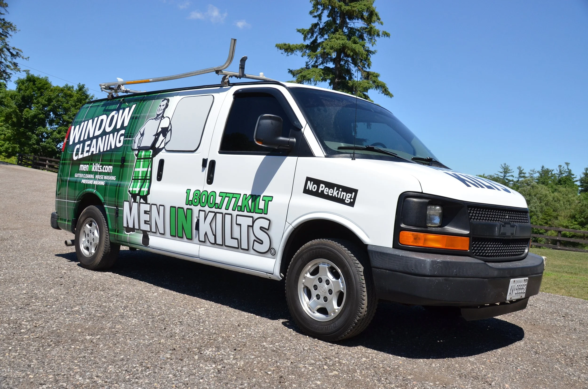 Men in Kilts van wrap side view 