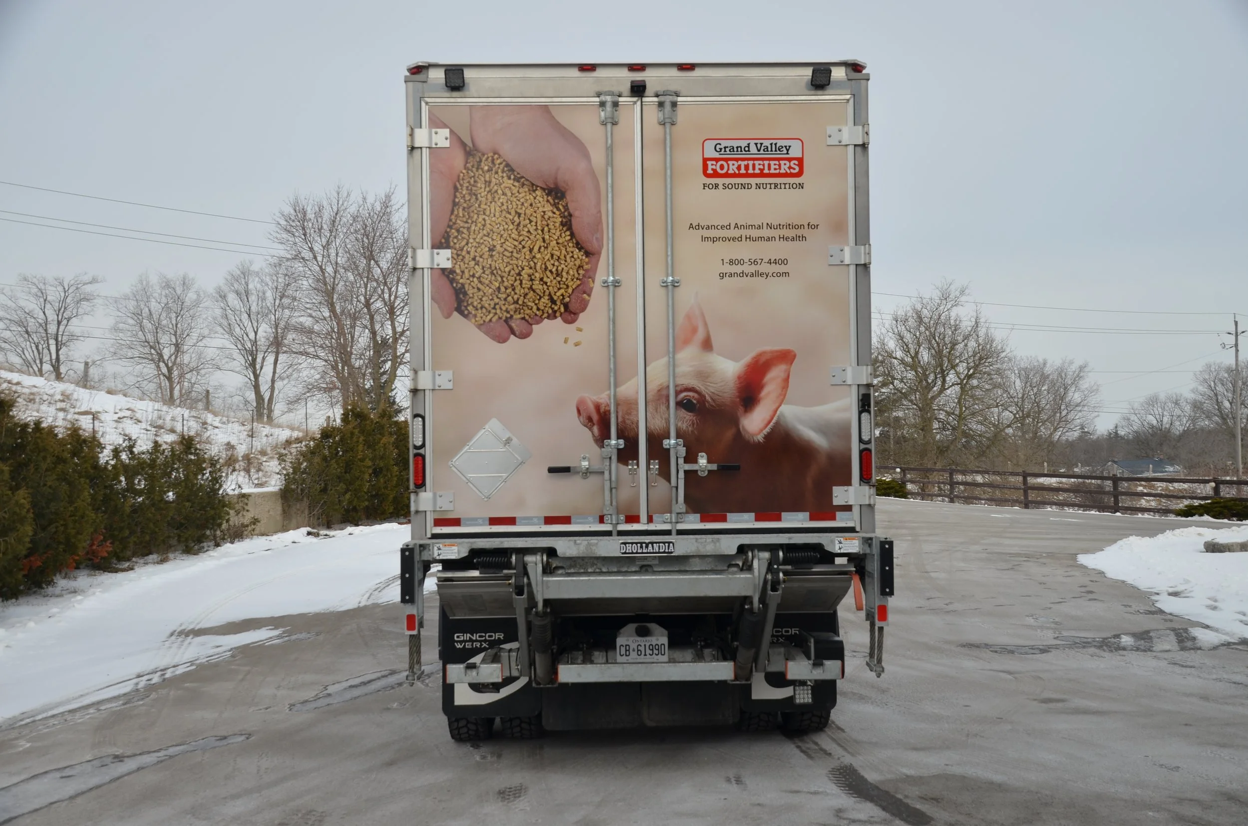 Grand Valley Fortifiers Canadian Hog Producers feed truck 3M wrap back