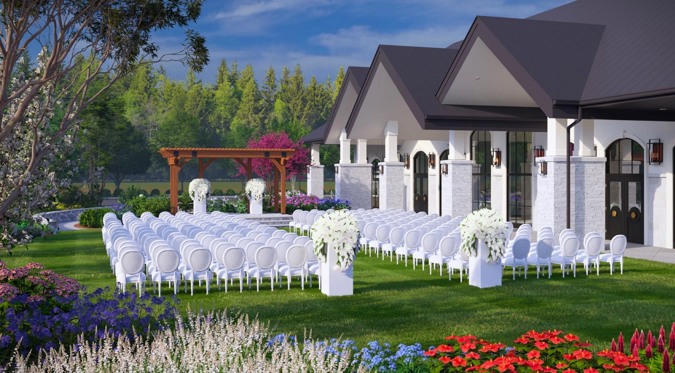 Wedding setup in a garden with rows of white chairs, floral arrangements, a wooden arbor, and a white house in the background surrounded by green trees and blooming flowers.