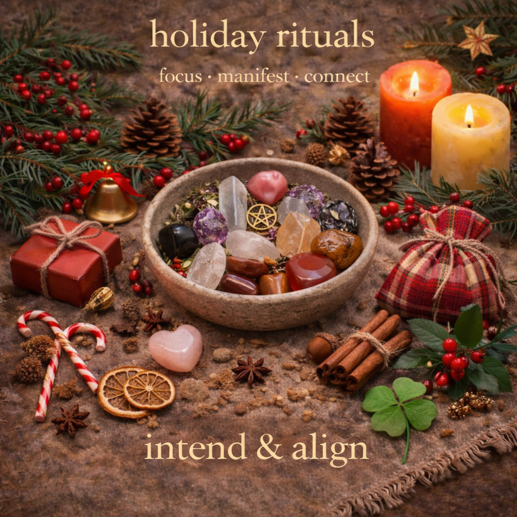 A holiday ritual setup with candles, Christmas decorations, crystals, a wrapped gift, a heart-shaped stone, cinnamon sticks, and dried orange slices on a rustic cloth. The text reads "holiday rituals focus, manifest, connect, intend & align."
