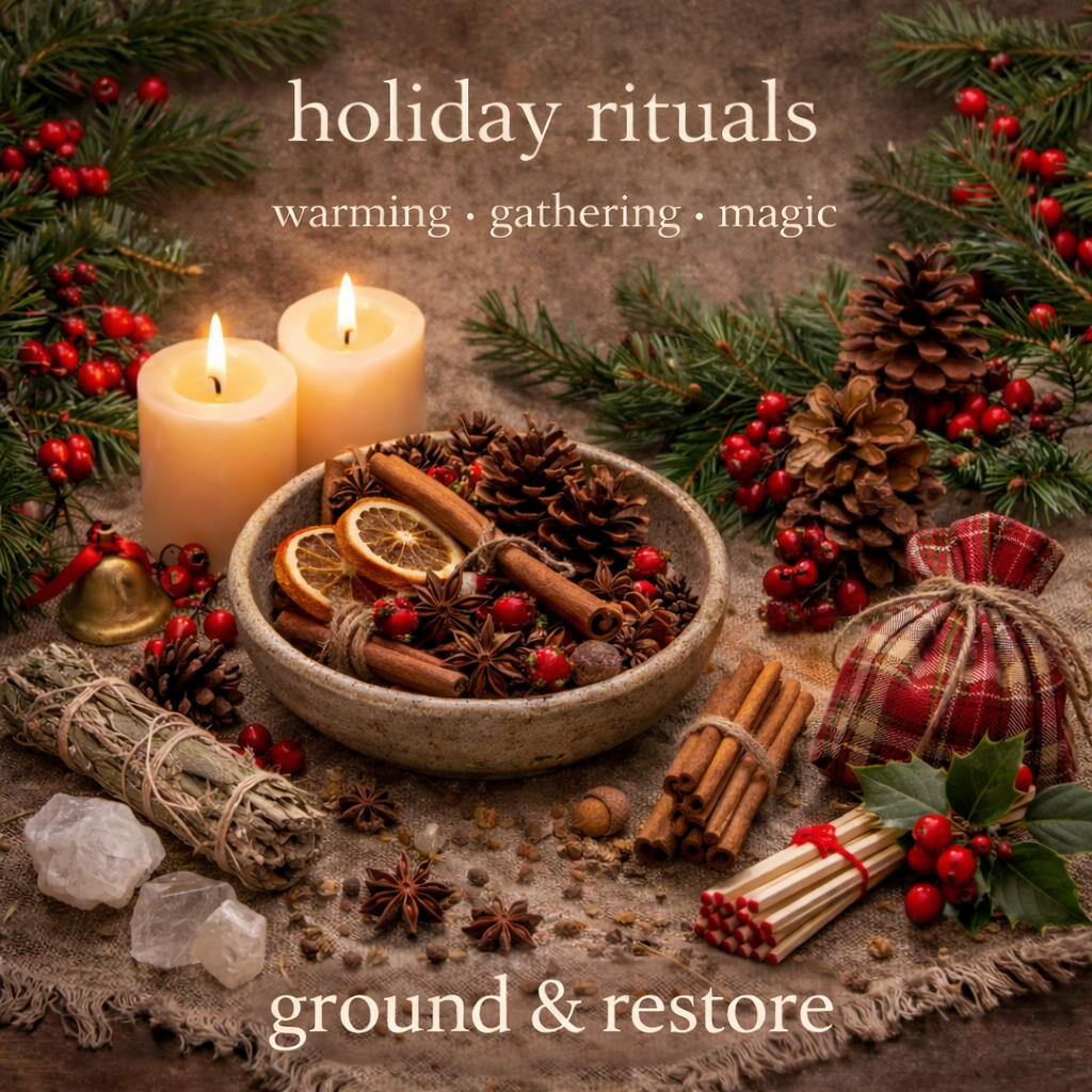 A festive Christmas scene with two lit candles, pinecones, evergreen branches with red berries, dried orange slices, cinnamon sticks, star anise, a bundle of sage wrapped with string, a small wrapped gift, and decorative salt and mineral stones on a burlap cloth, with the text 'holiday rituals' and 'ground & restore'.