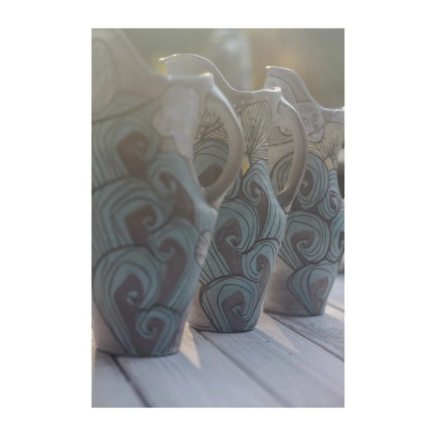 Backlit pitchers 
&bull;
Getting ready for @thepatchworkshow this Saturday in Oakland. Glazing and firing this week to have fresh wares to share. 
.
.
.
.
.
.
.
.
.
.
.
.
.
#artist #ceramica #ceramicart #ceramicartist #potter #decoration #surfacedesi