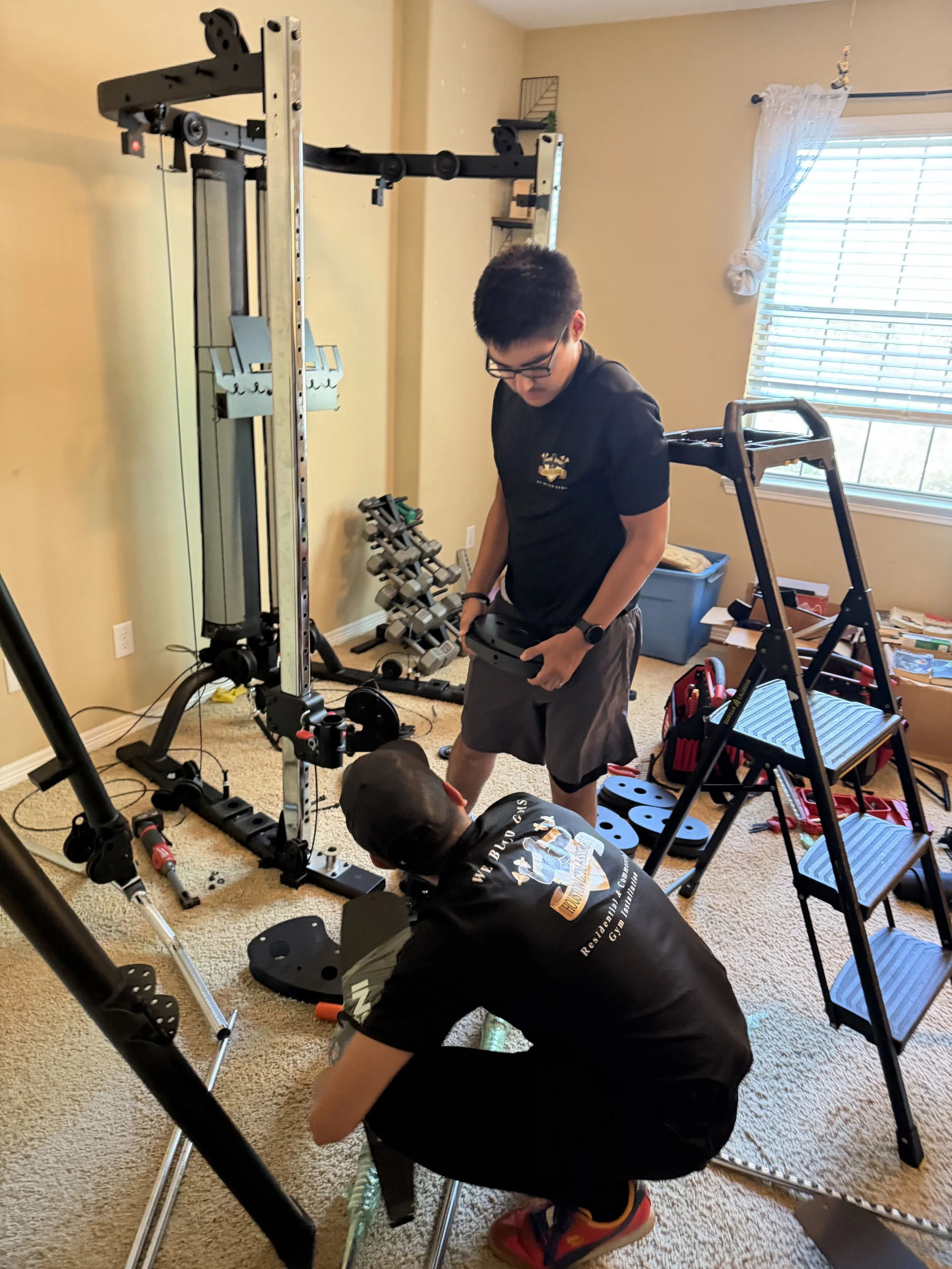 houston-fitness-equipment-movers-inspire-ft2-disassembly.jpg