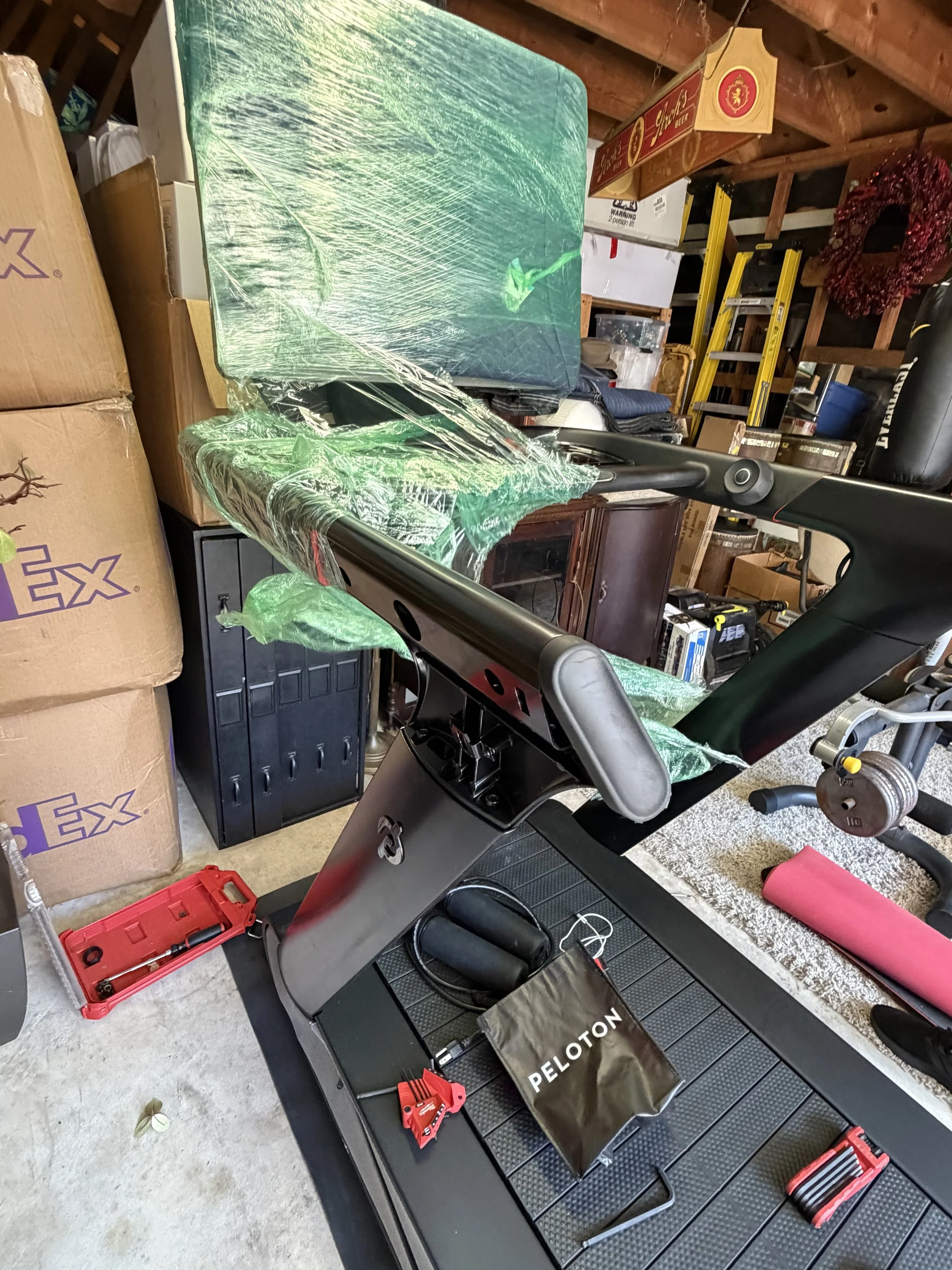 Peloton Tread Plus being professionally reassembled after relocation in a Houston home