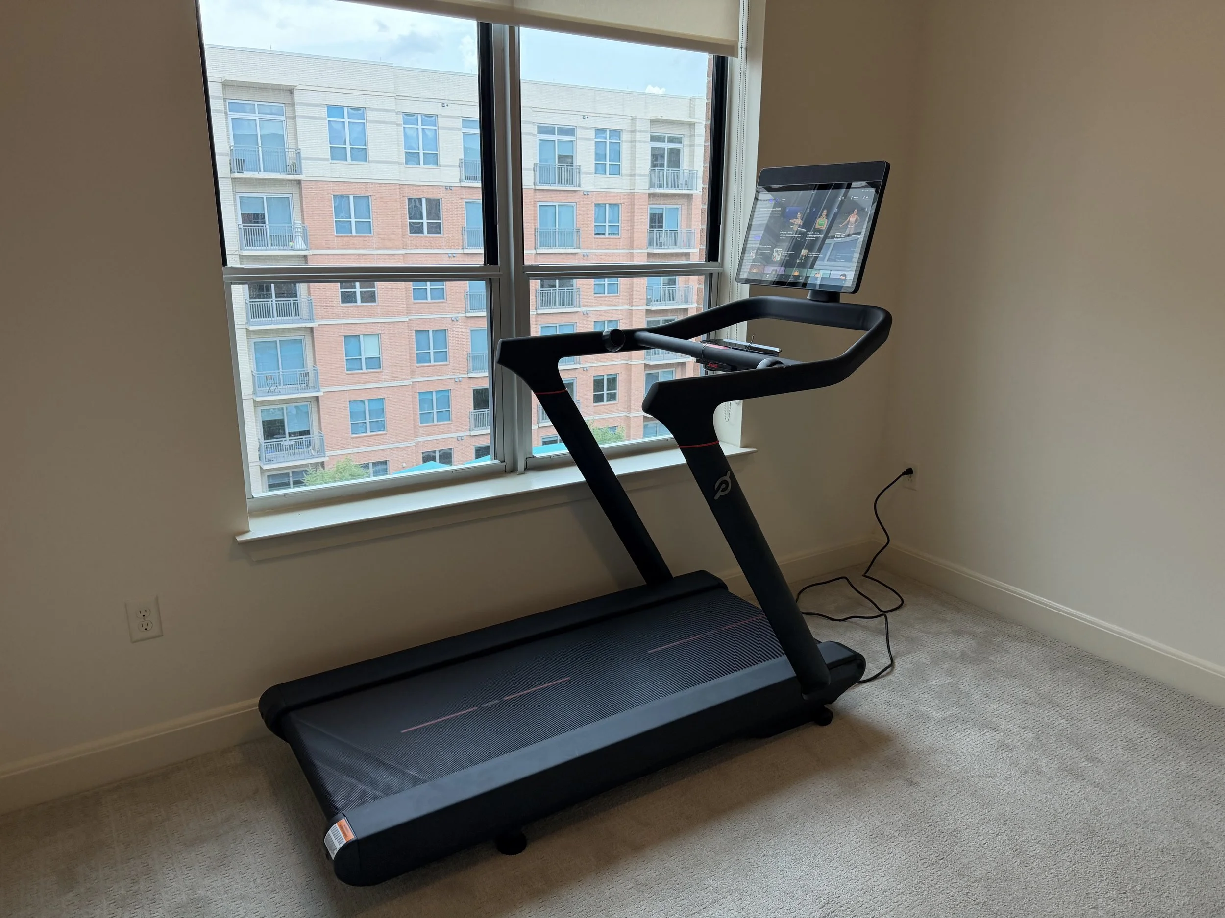 Peloton Tread Plus reassembled and tested after an upstairs move in a Houston home