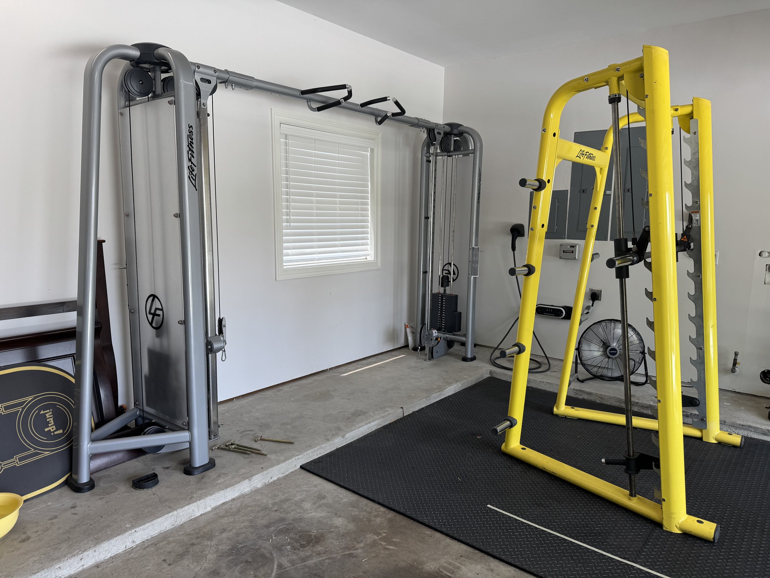 Life fitness switch machine and cable machine.