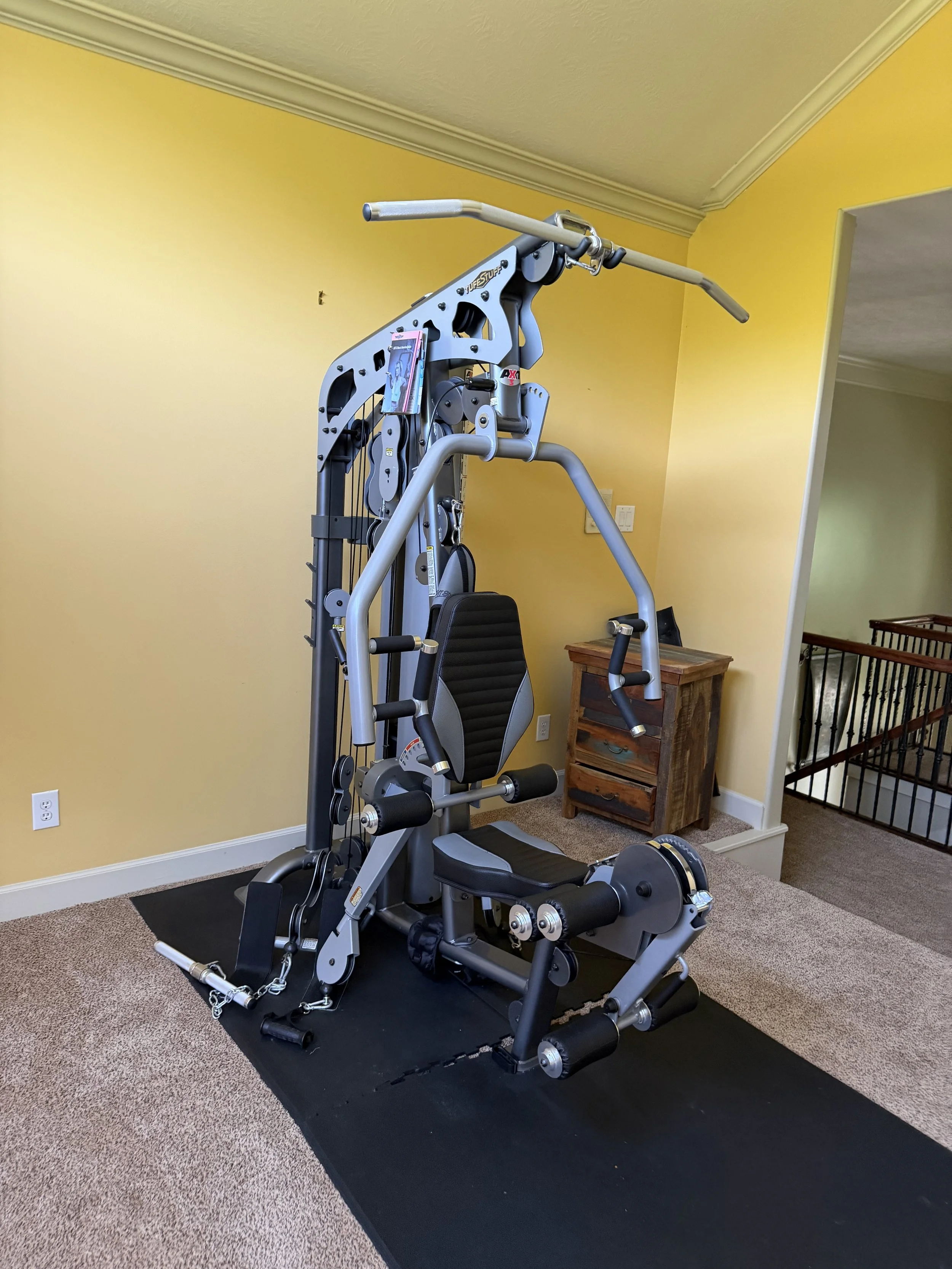 TuffStuff home gym before professionally disassembling and moving it to another home by Houston Gym Assembly.