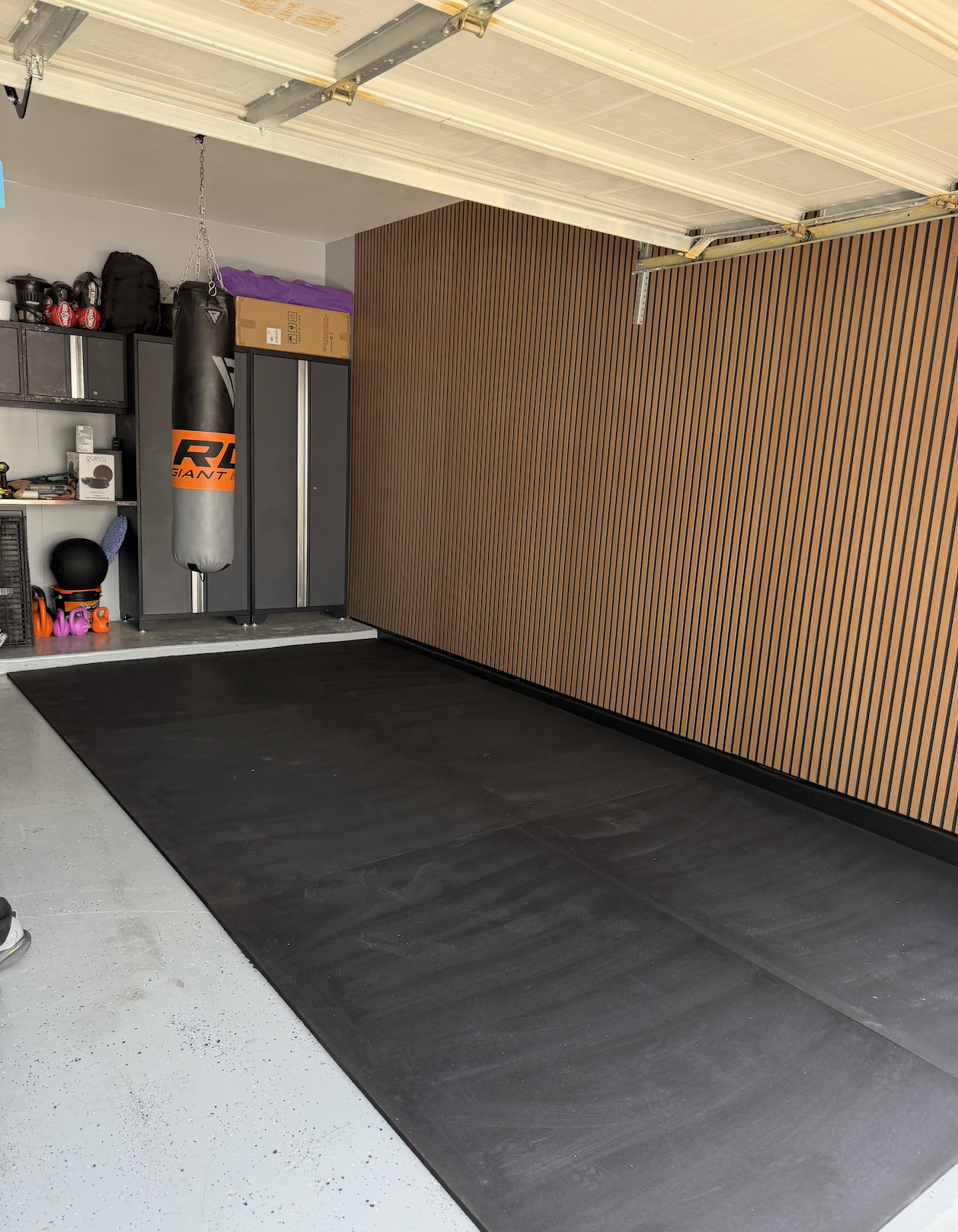 Garage before home gym equipment was professionally reassembled and installed.