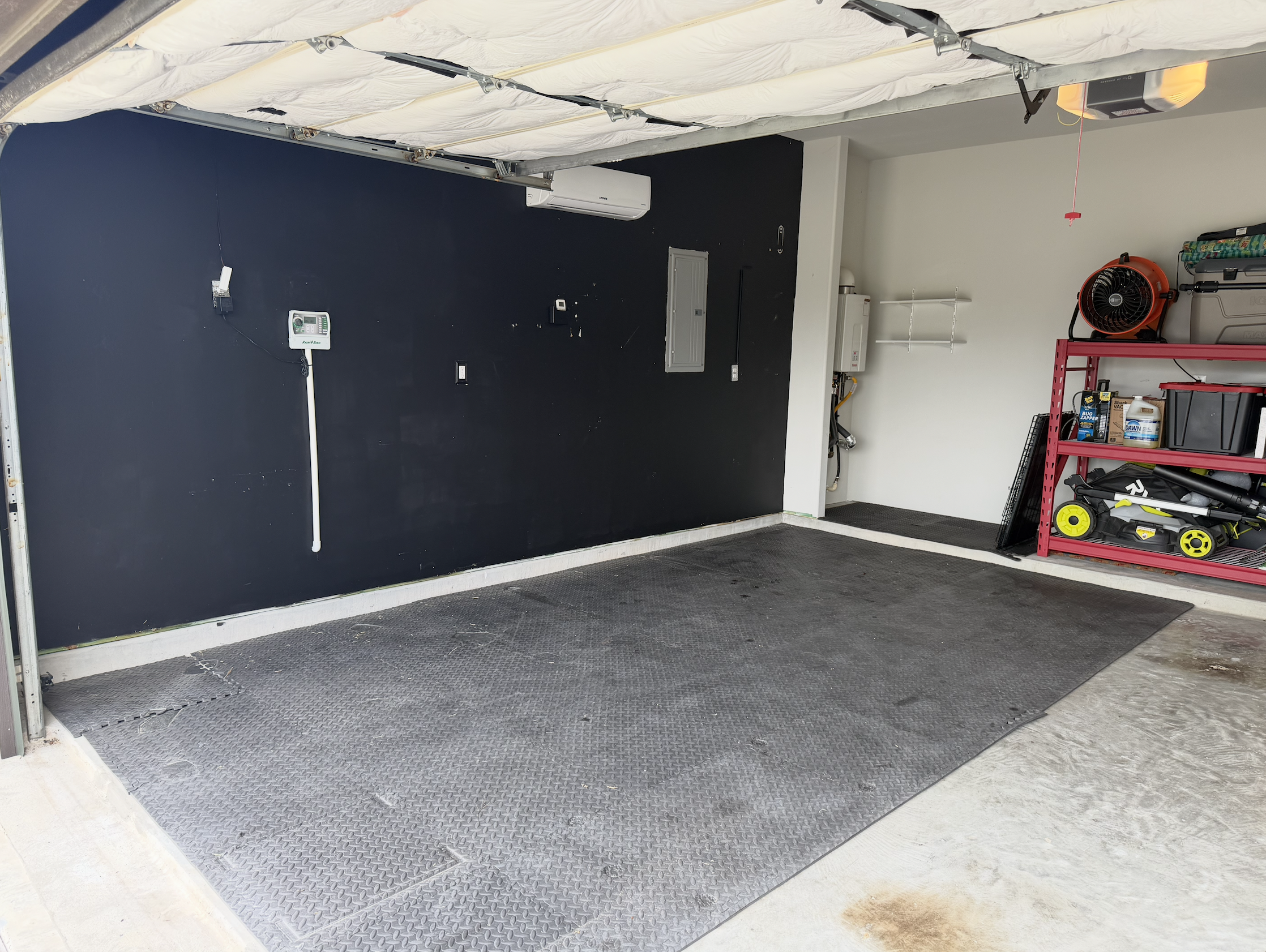 Garage after home gym equipment was professionally disassembled and relocated.