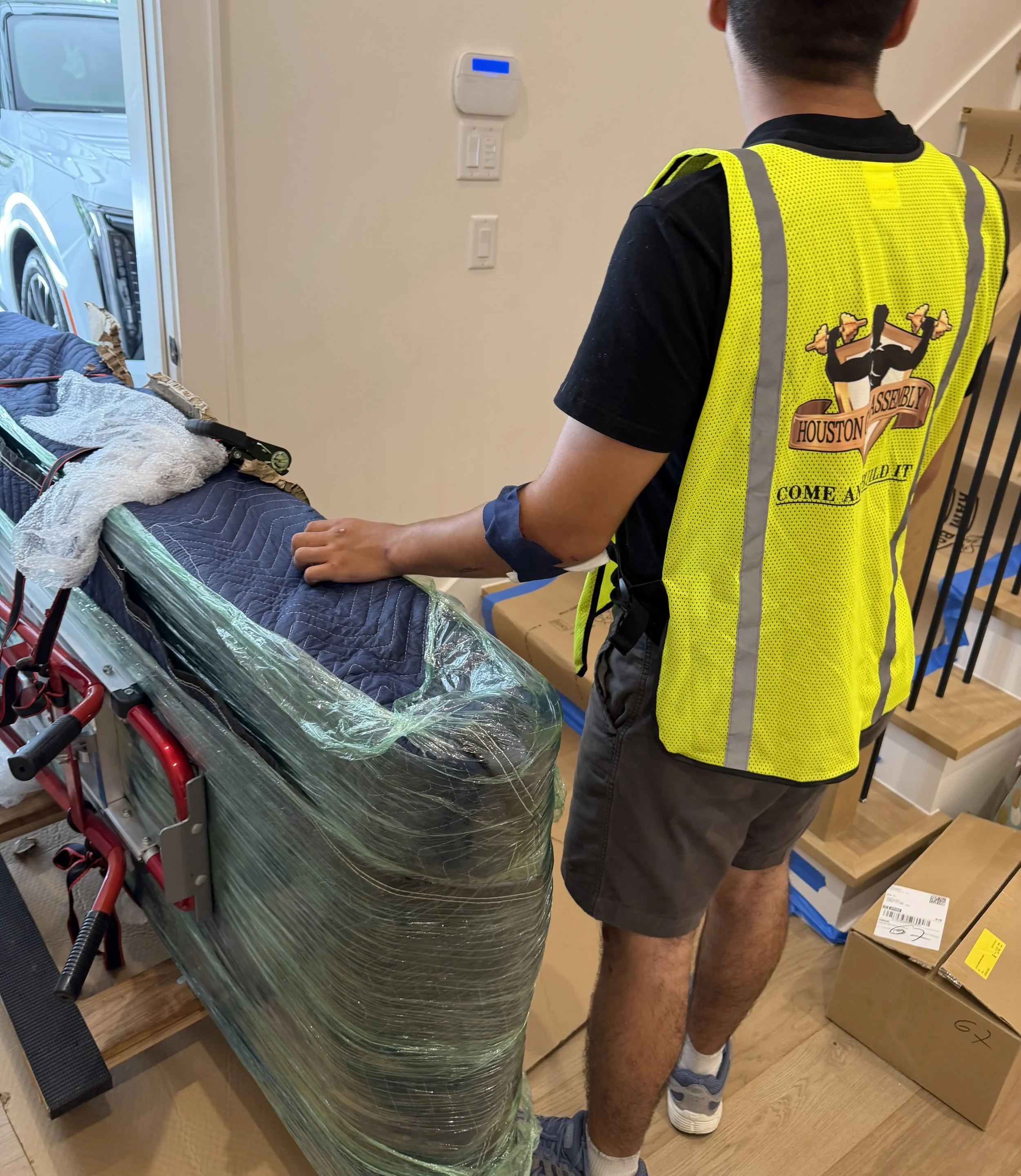 Houston Gym Assembly technician preparing a Peloton Tread Plus for relocation in Houston