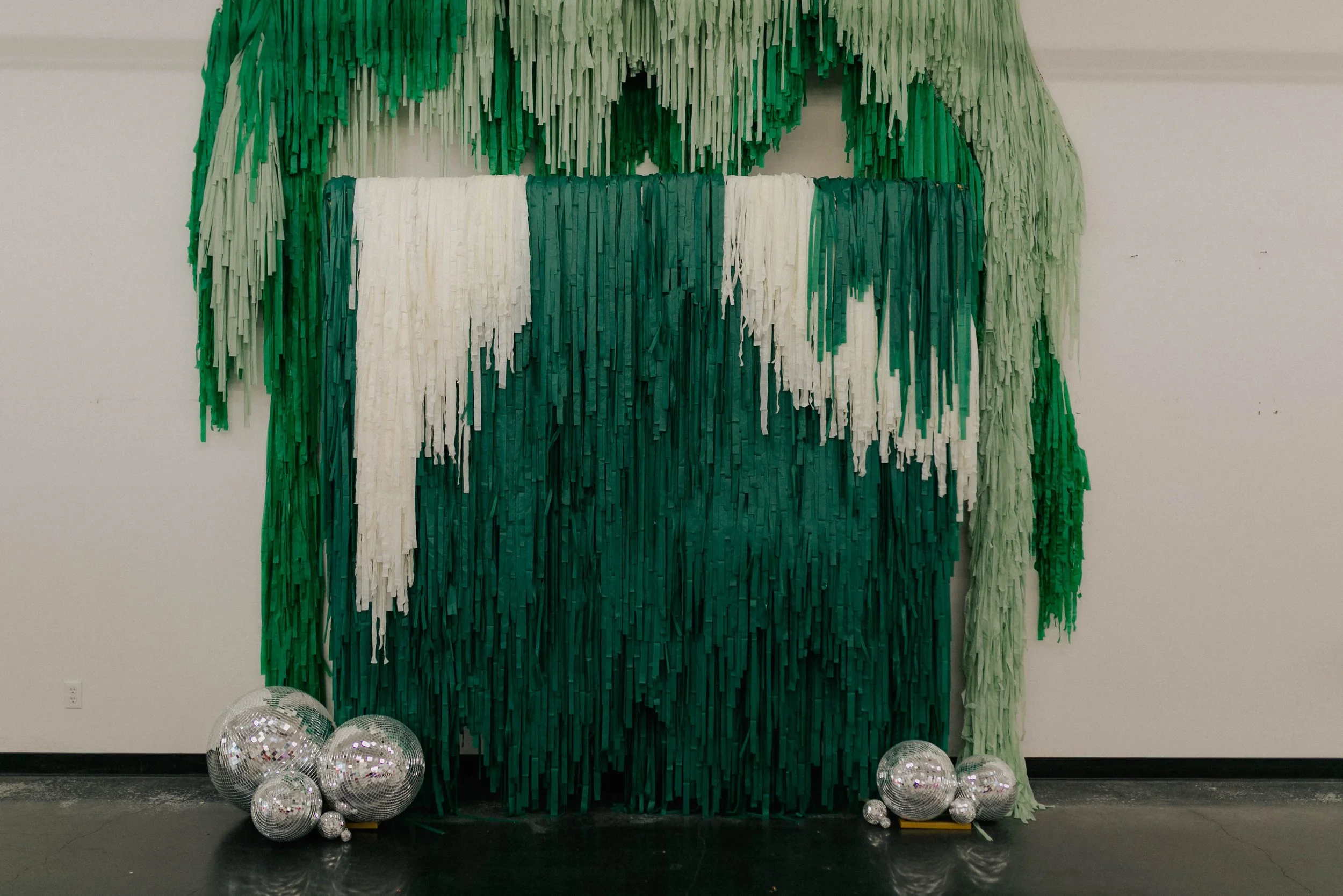 green fringe wedding backdrop