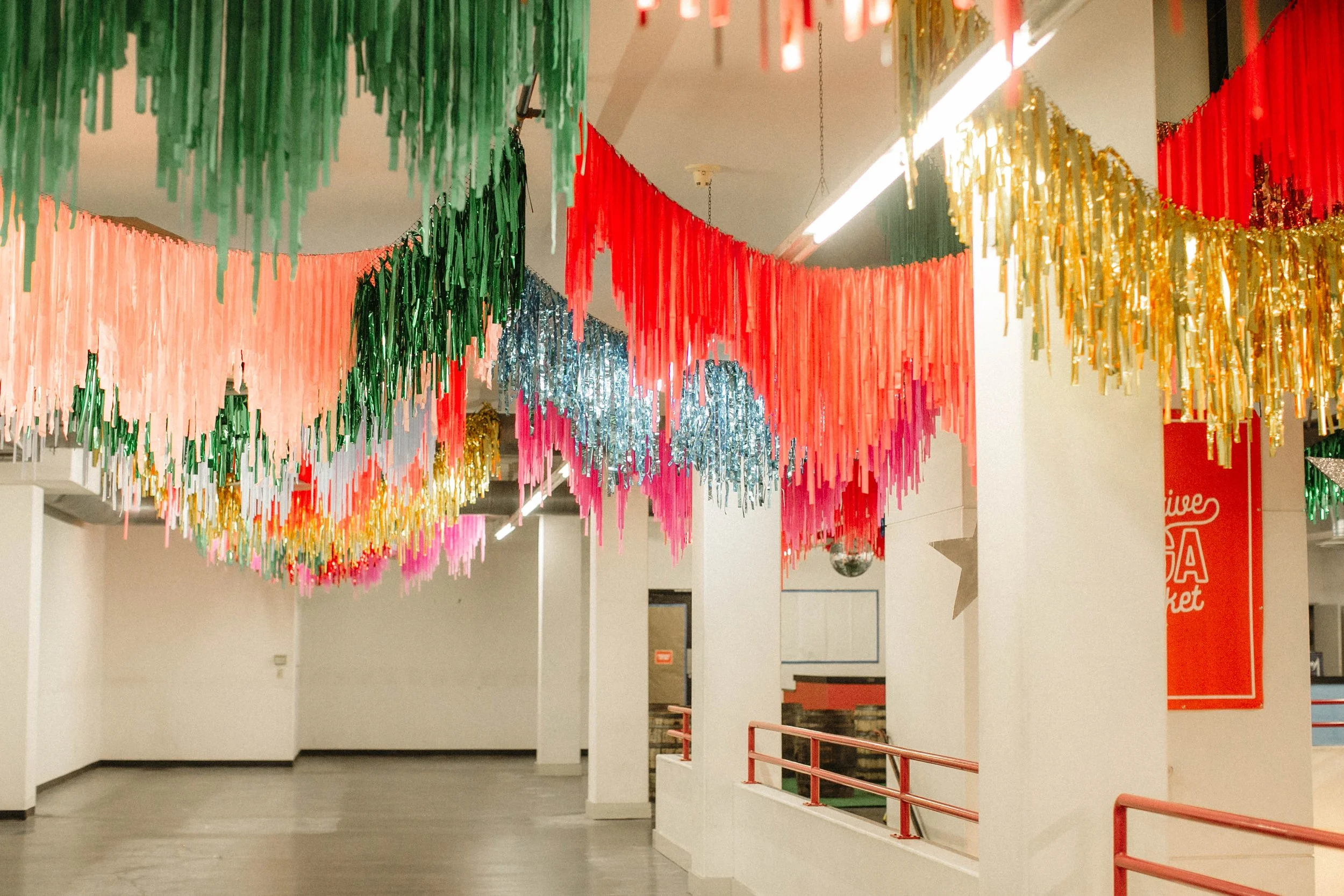 Aerial fringe installation, baby shower, birthday, wedding, corporate event, brand events, grand opening, Collective Santa Cruz